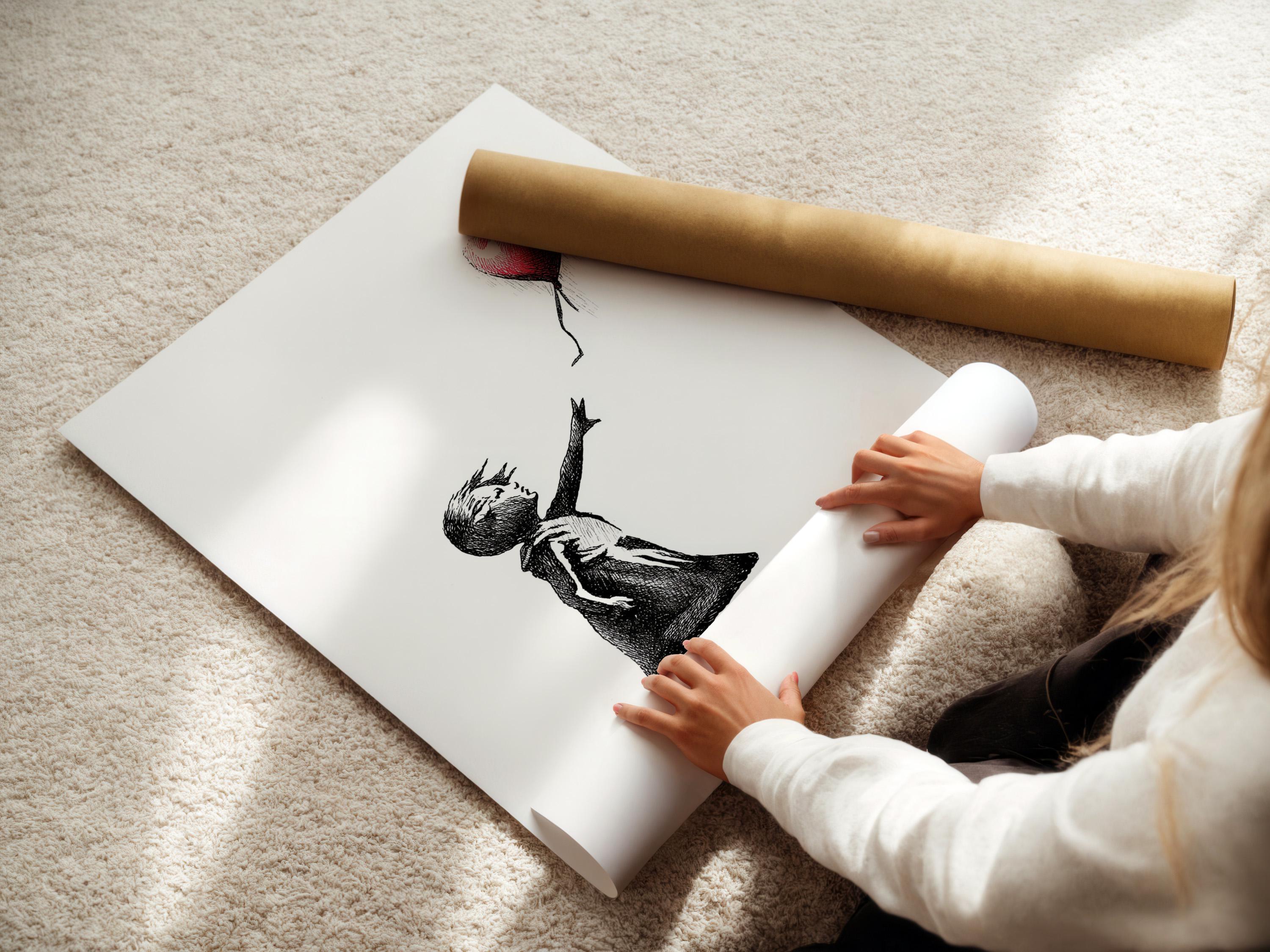 Room mockup showing a framed black and white girl sketch with a red heart balloon