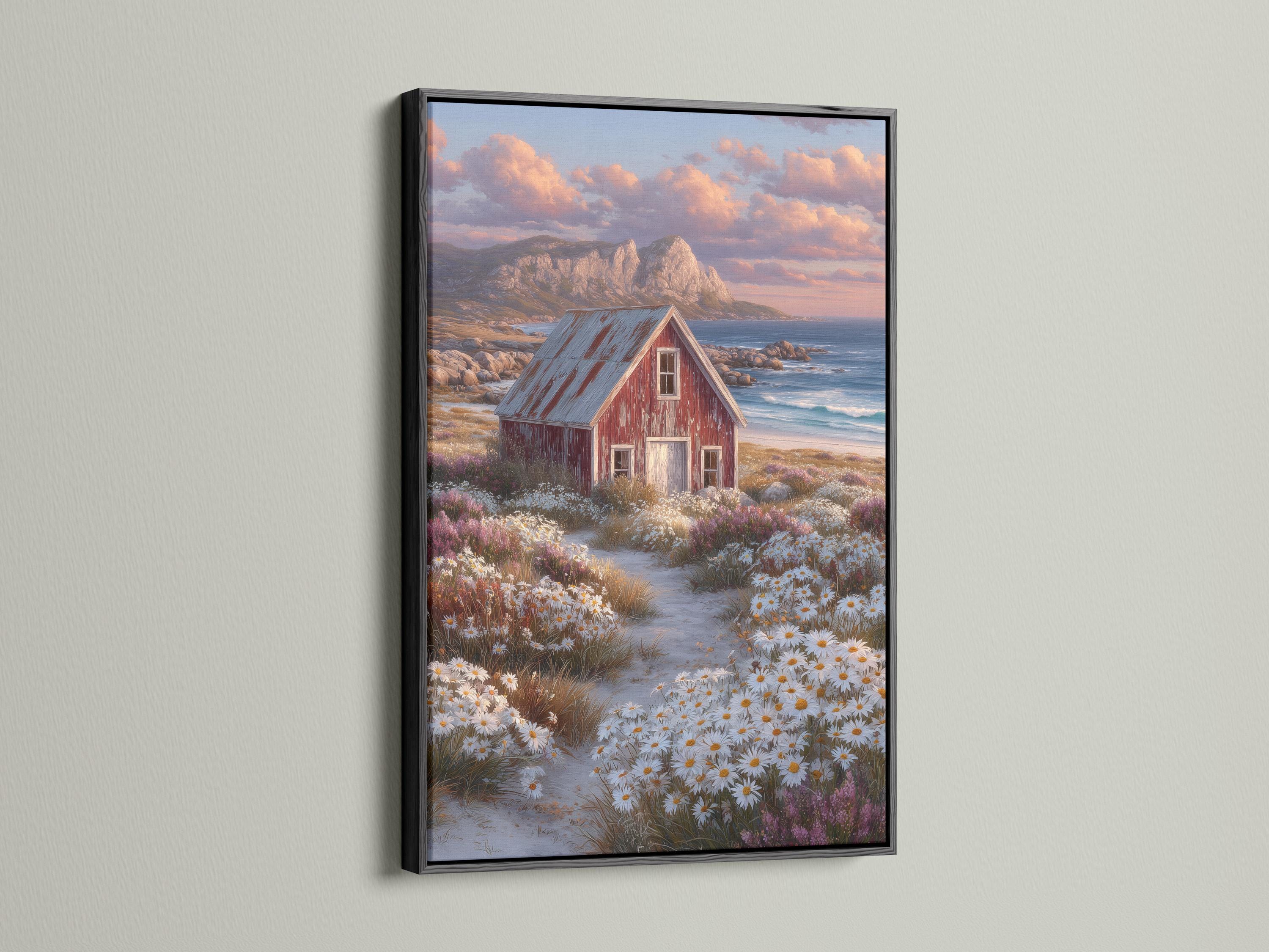 Red barn in a daisy field with ocean and sunset clouds in the background detail view