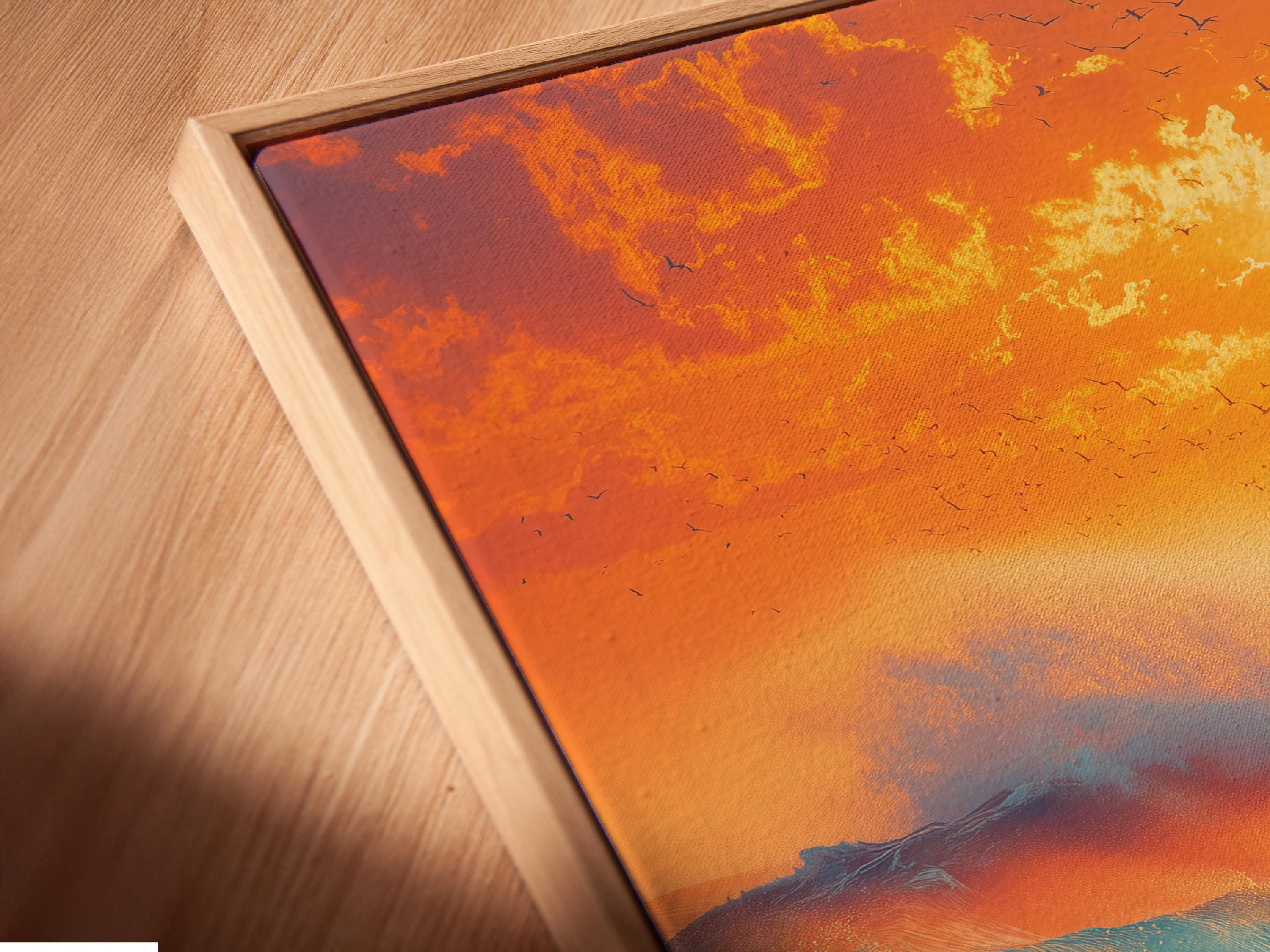 Sunset seascape with teal ocean waves, orange and gold sky, sun glow, and bird silhouettes detail view