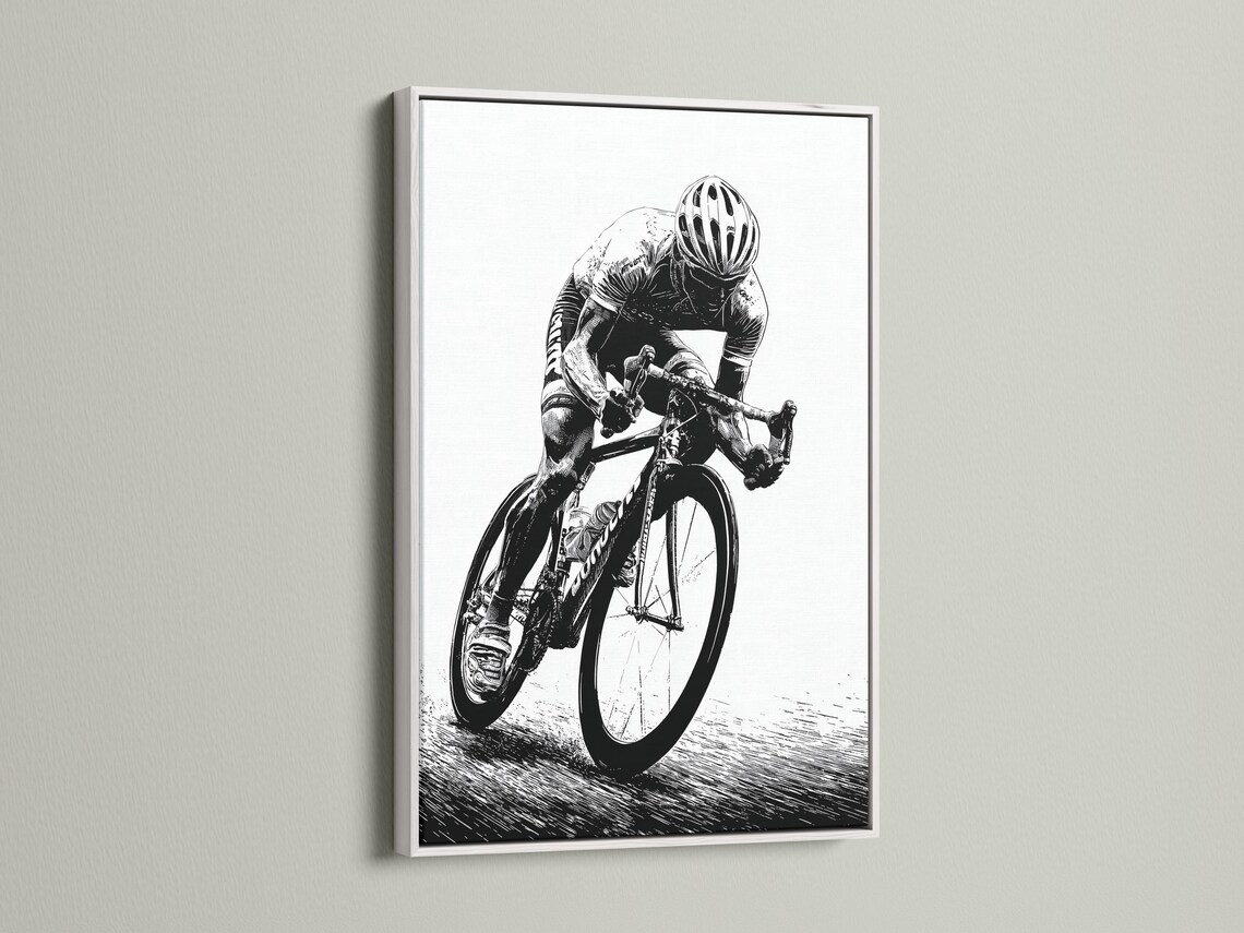 Room mockup showing a framed black and white cyclist illustration on a wall