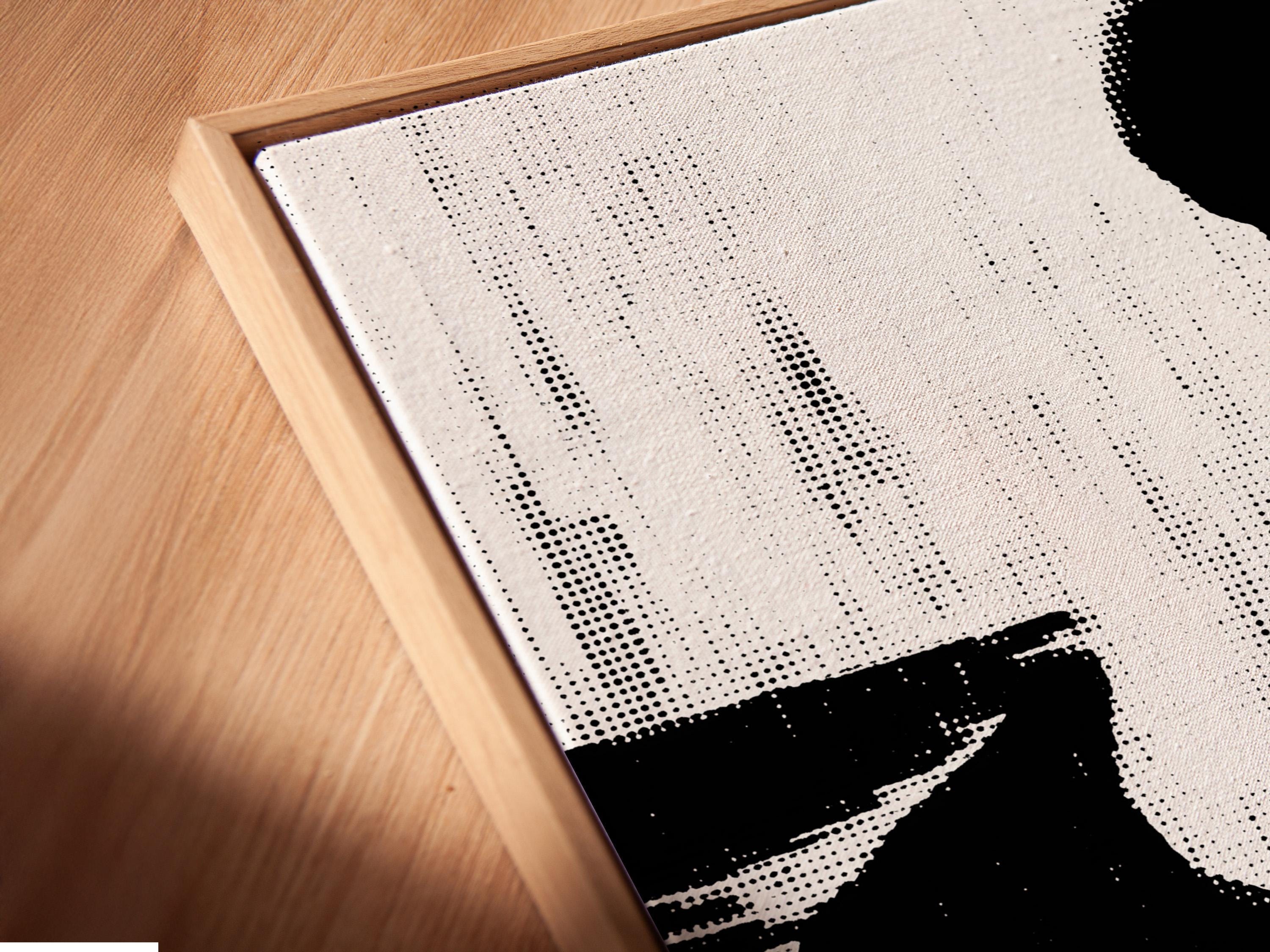 Black-and-white musician silhouette framed artwork on a wall mockup