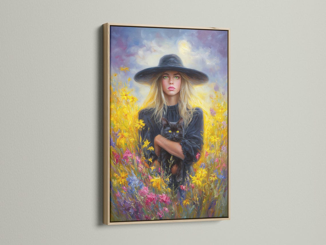 Blonde witch in a wide hat holding a black cat in a field of bright flowers detail view
