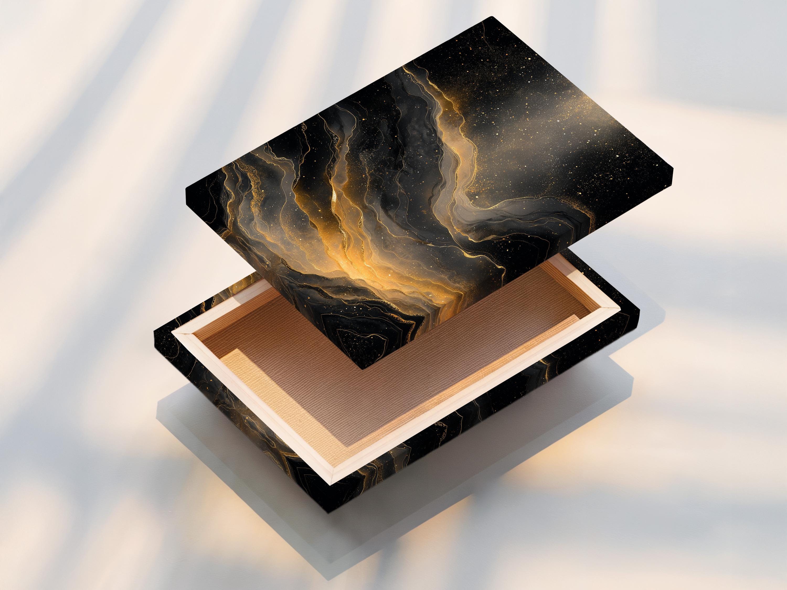 Black and gold abstract artwork with glowing vein-like lines and sparkling speckles detail view