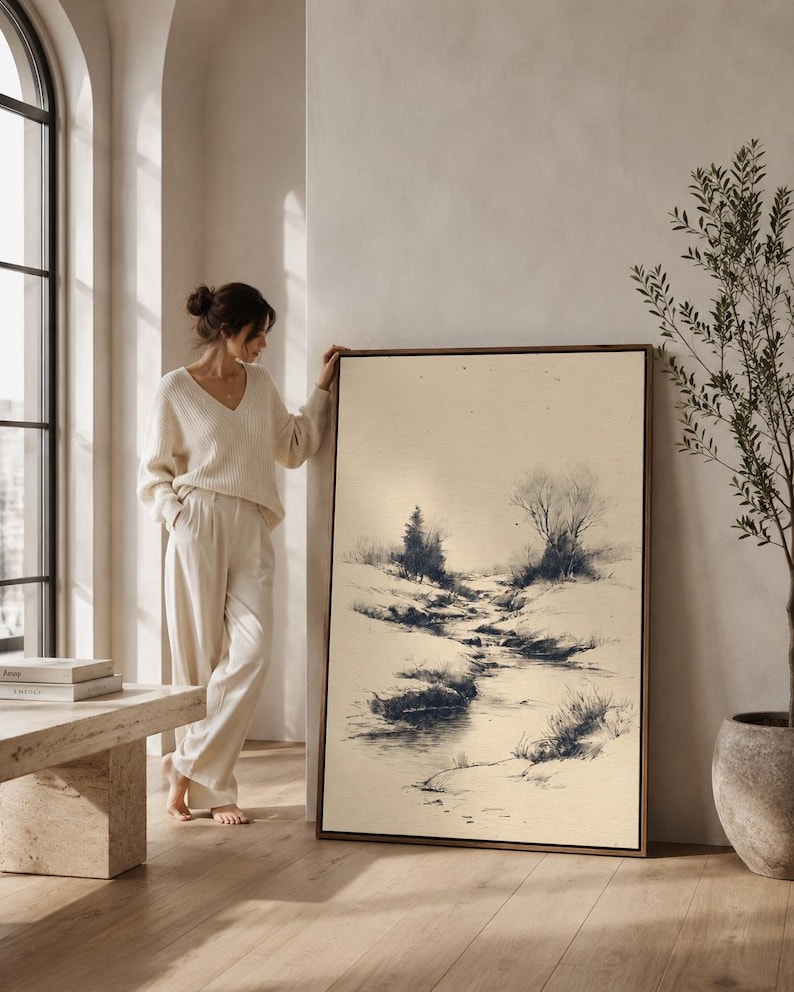 Beige minimalist river landscape sketch with black linework for shrubs and a winding stream