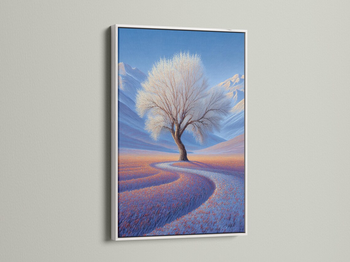 Lone leafless tree in a blue winter landscape with snowy hills and a warm orange horizon glow detail view