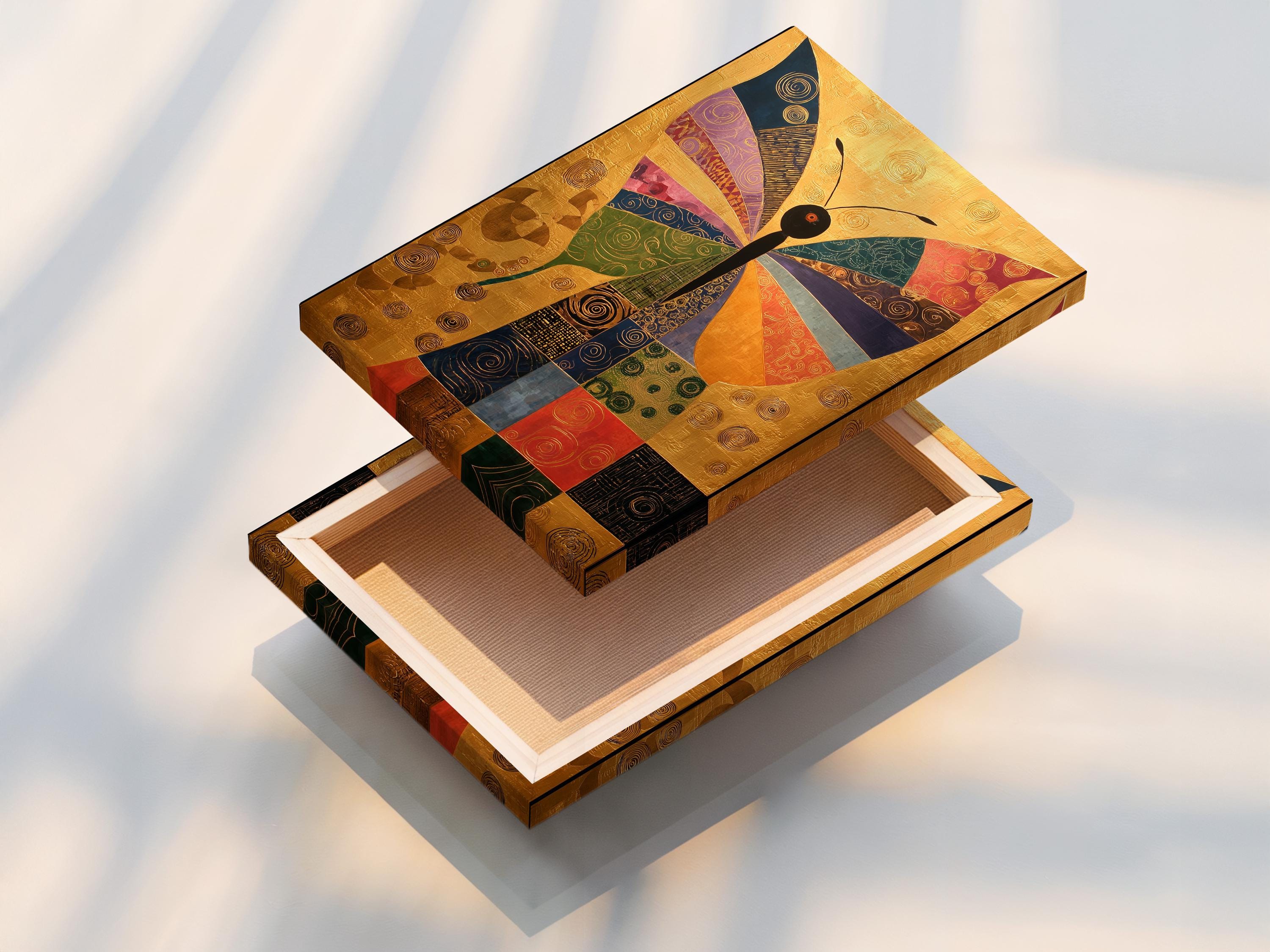 Geometric butterfly artwork with gold background and multicolour swirl-patterned wings detail view