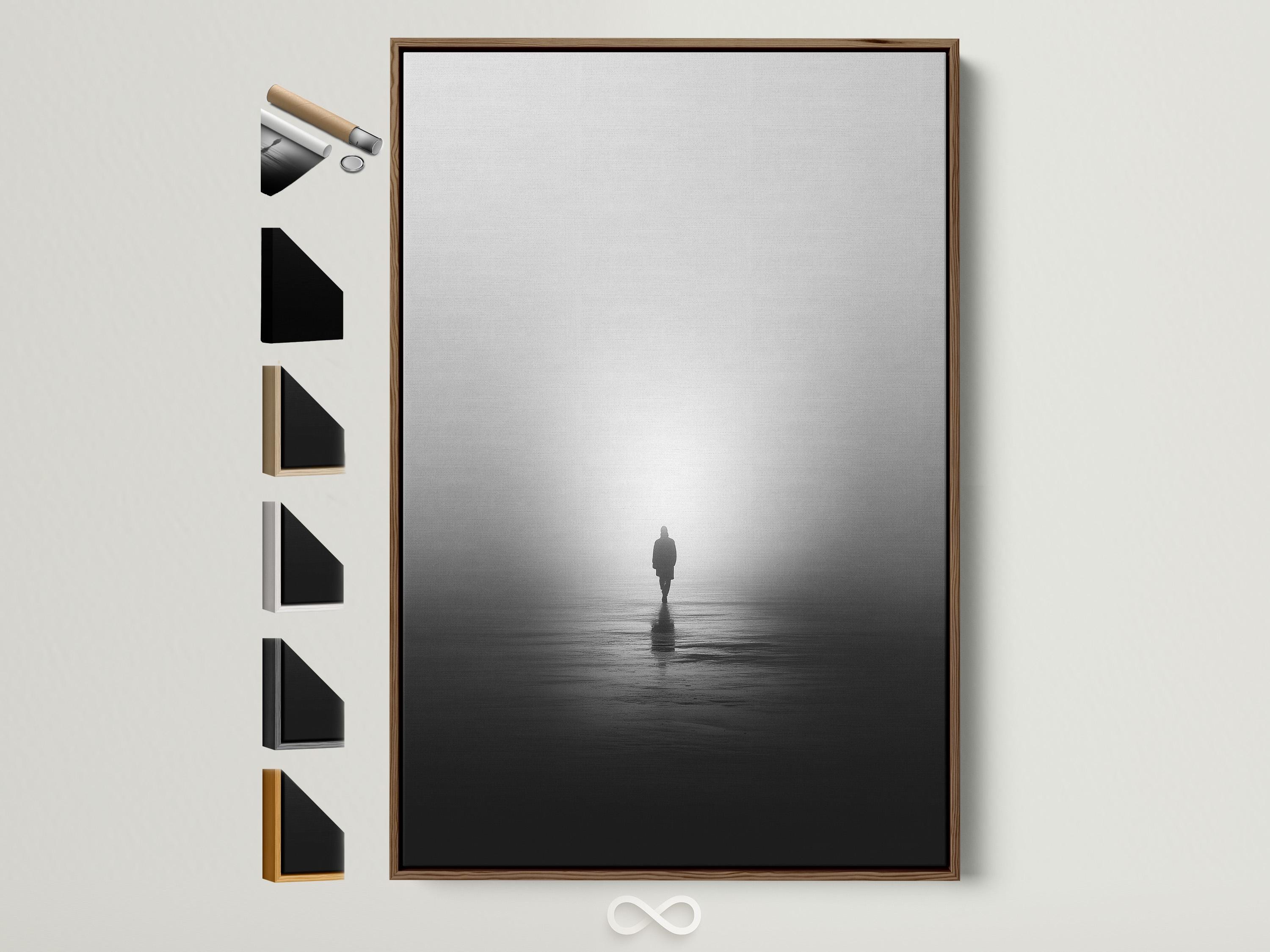 Monochrome misty shore scene with a solitary standing figure and reflection on dark water