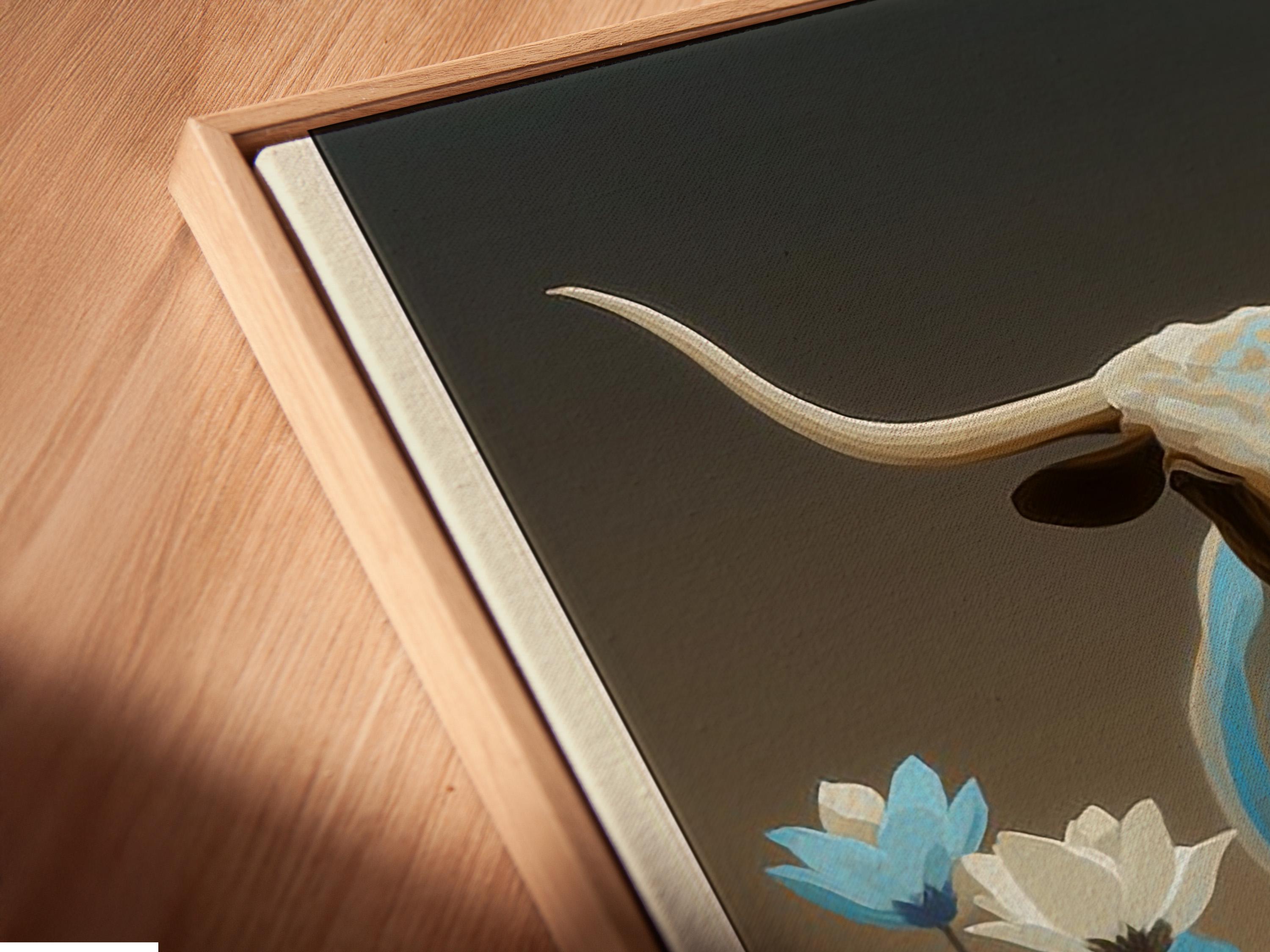 Longhorn bull artwork mockup on a wall with wildflowers and a framed design