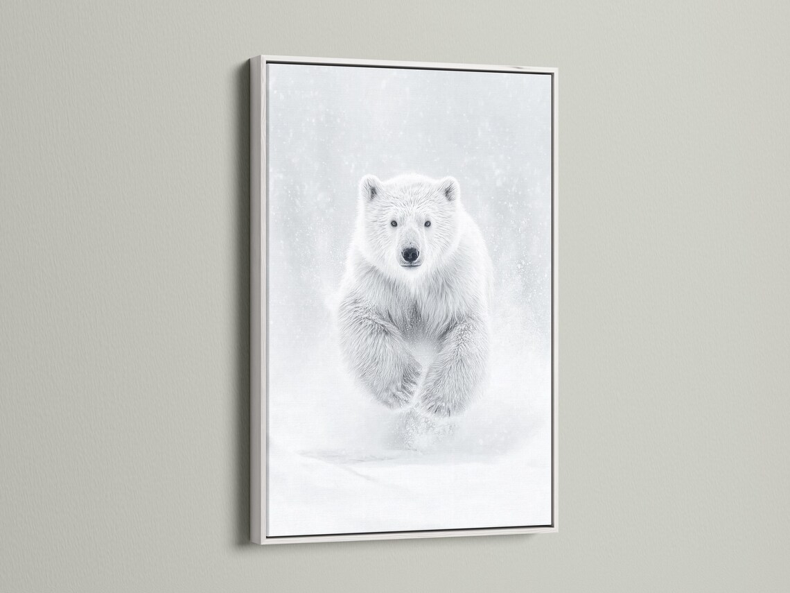 Room mockup showing a framed monochrome polar bear running artwork