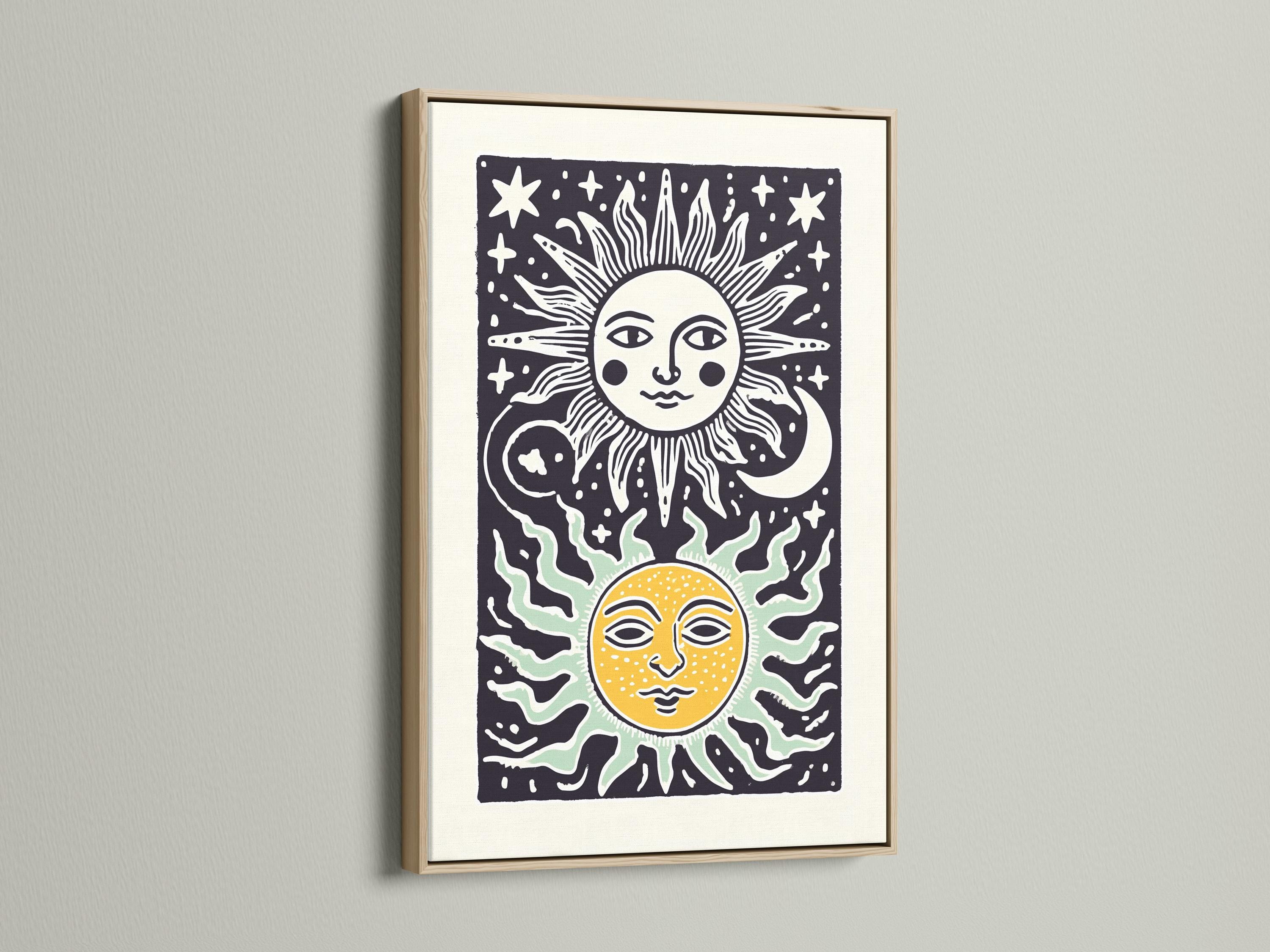 Room mockup showing framed sun and moon celestial artwork on a wall with decorative items nearby