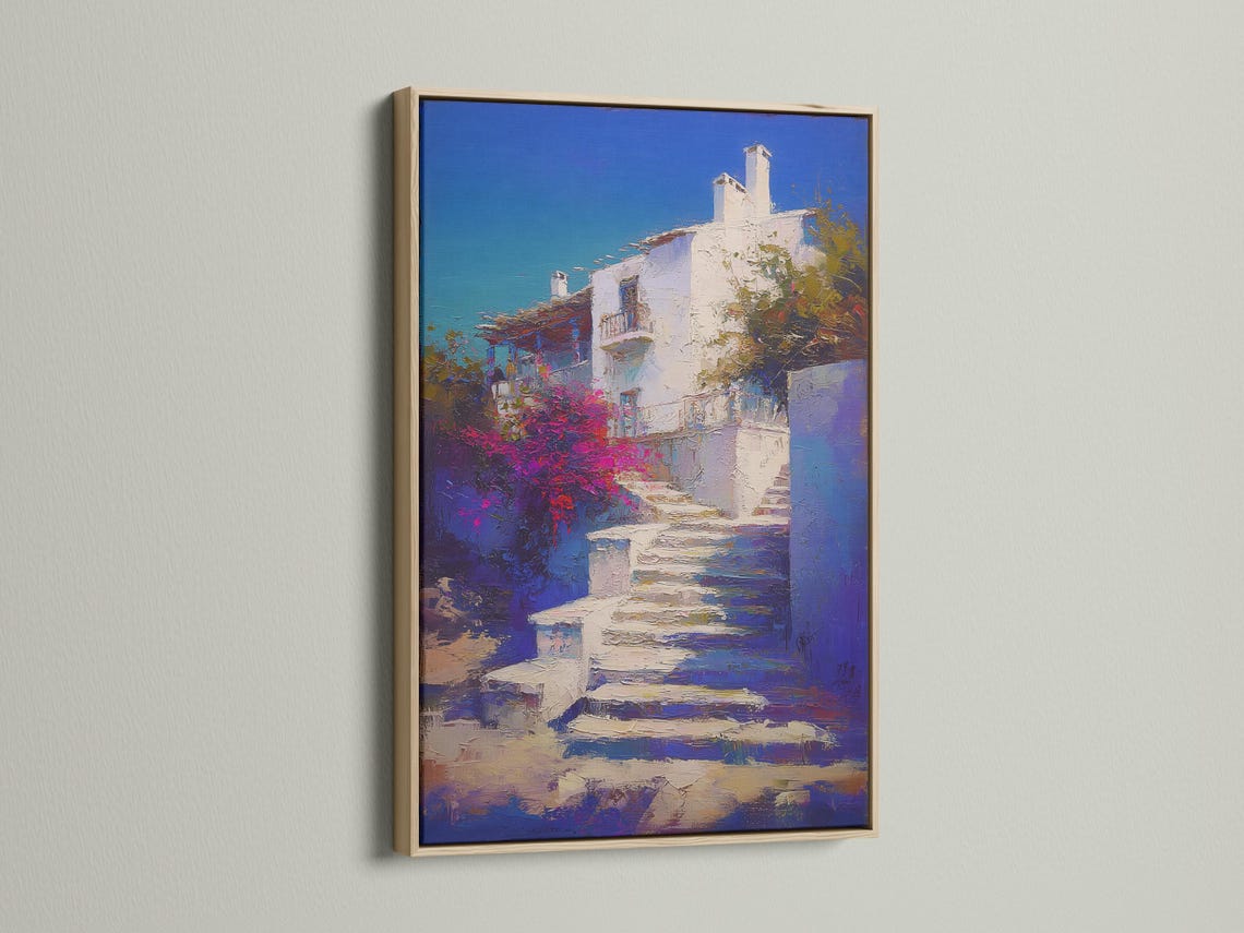 Painterly blue sky coastal buildings with whitewashed walls and vivid magenta vegetation detail view