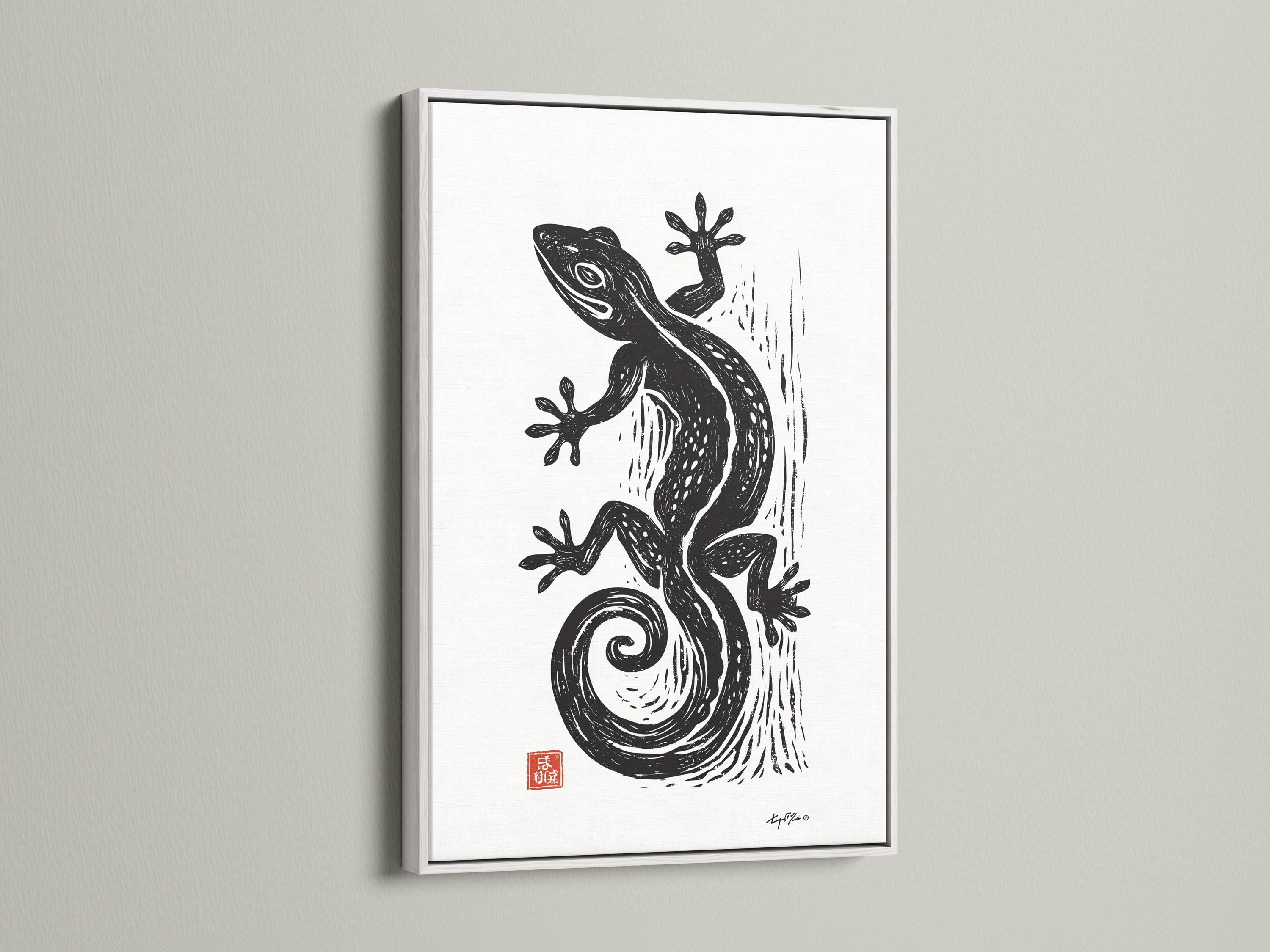 Room mockup showing framed lizard illustration on a wall with small red seal detail