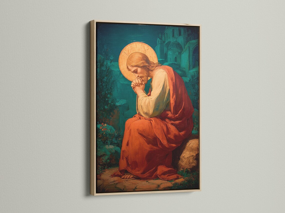 Wall mockup showing a framed painting with a praying figure and gold halo on a beige wall