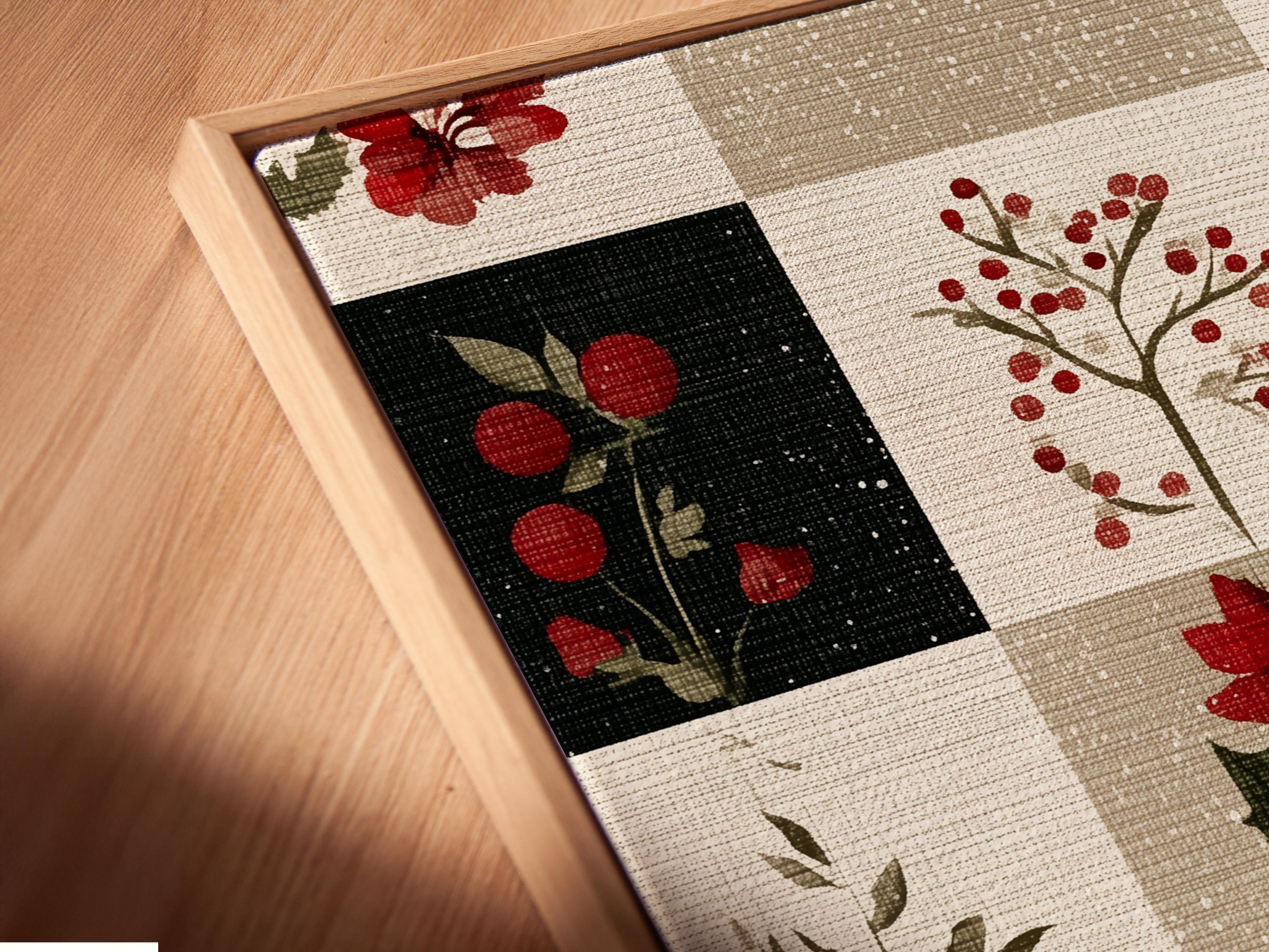 Patchwork floral artwork with red flowers and berries on cream, beige, and dark blocks detail view