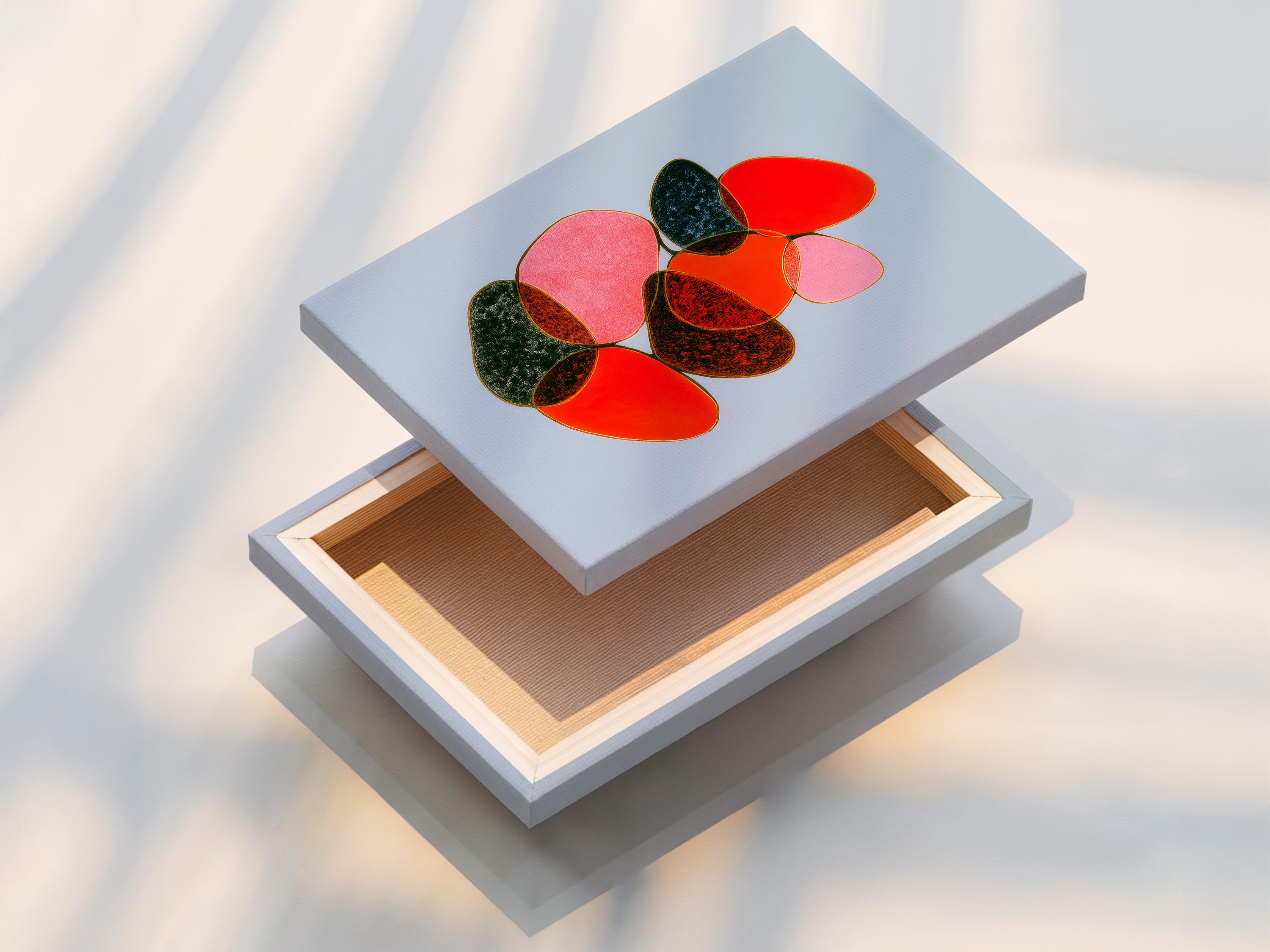 Room mockup showing a framed abstract artwork with overlapping red, pink and green shapes on a light blue background