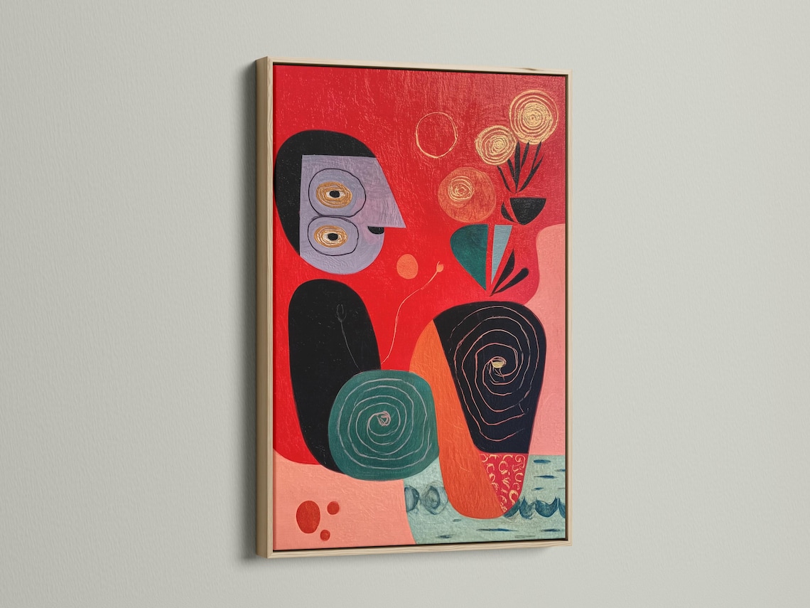 Abstract face artwork with red background, teal accents, black outlines and spiral details detail view