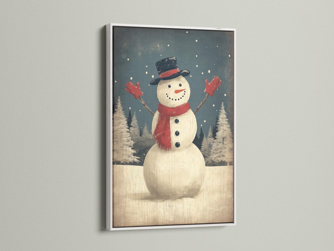 Snowman standing in falling snow with a dark top hat and red scarf in a winter forest scene detail view