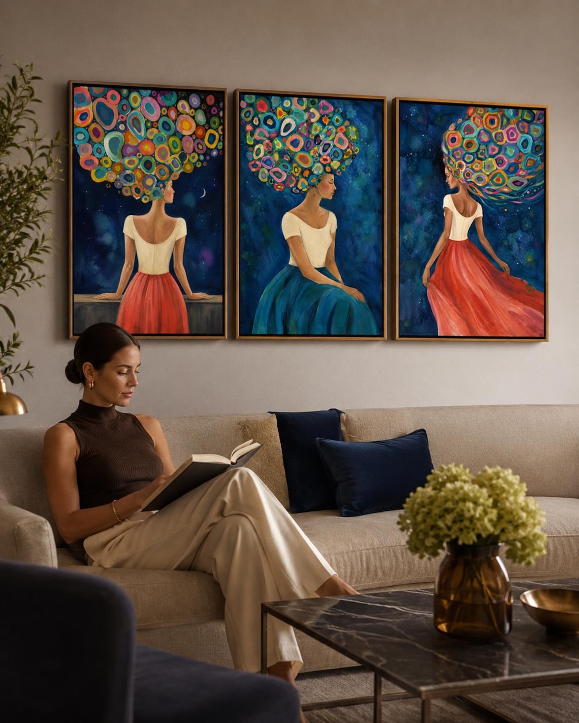 Three framed abstract female portrait artworks displayed on a wall