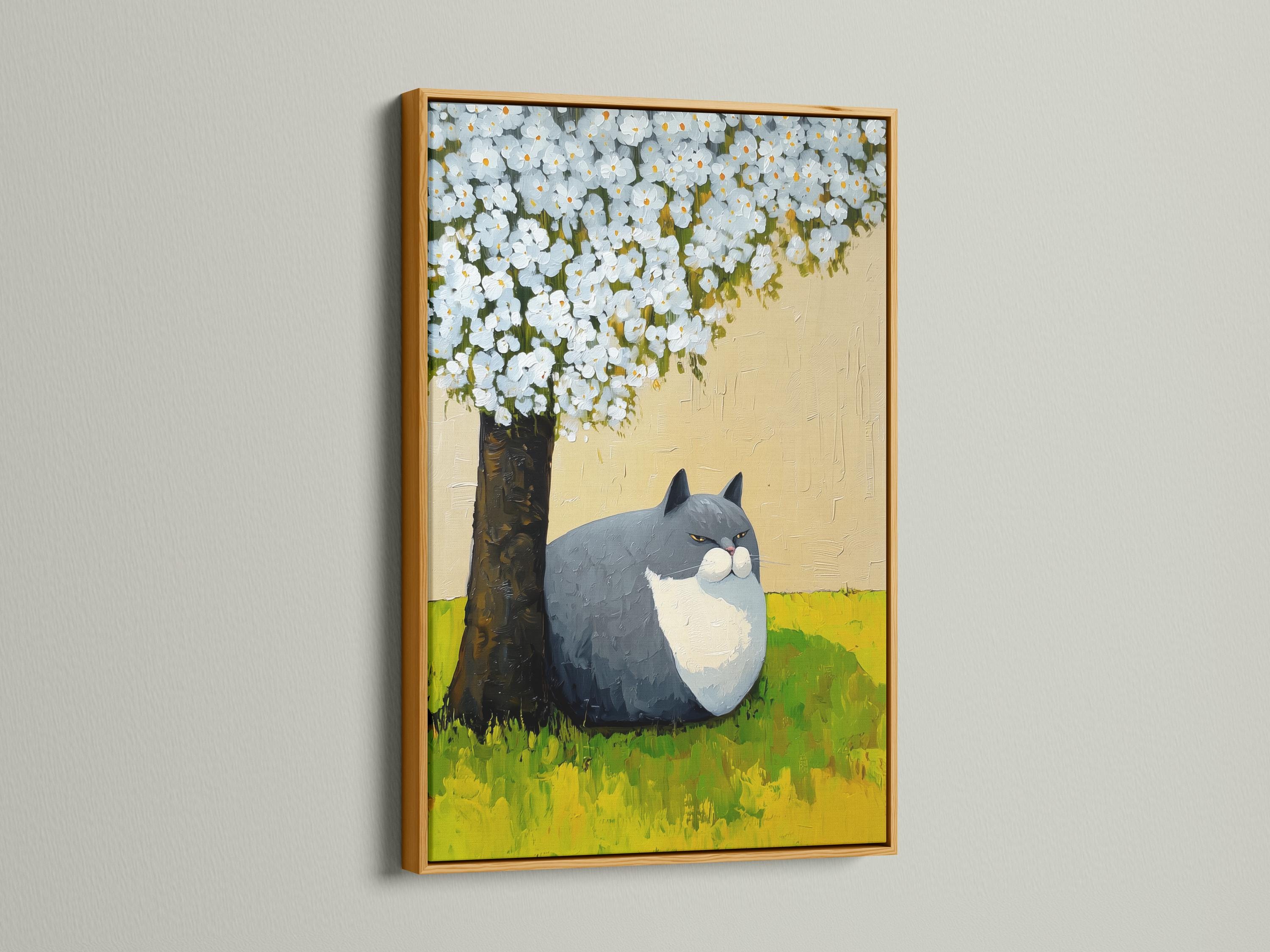 Grey and white cat lying on green grass beneath a tree with white blossoms detail view