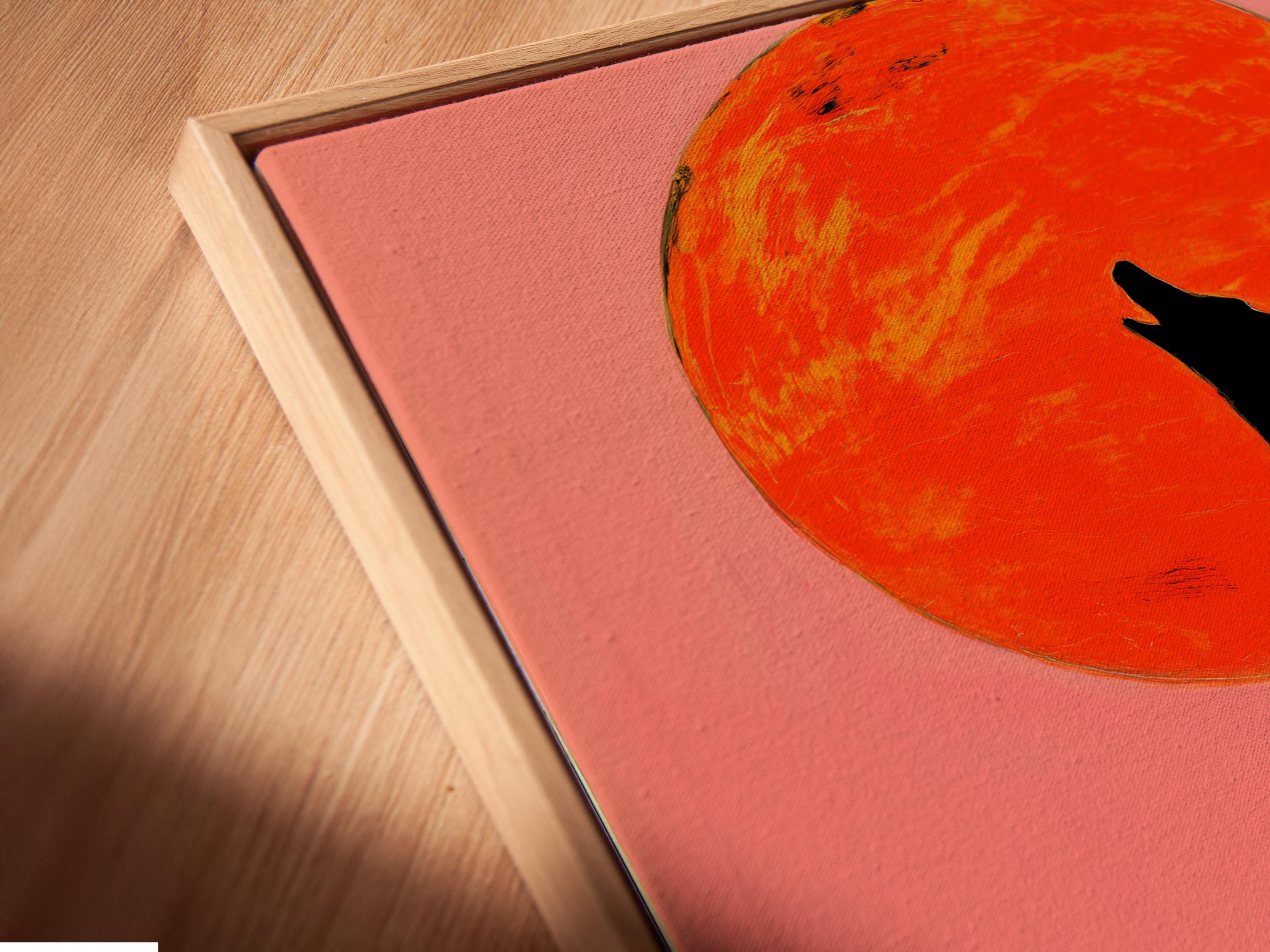 Black howling wolf silhouette under an orange-red full moon with abstract multicolour reflection detail view
