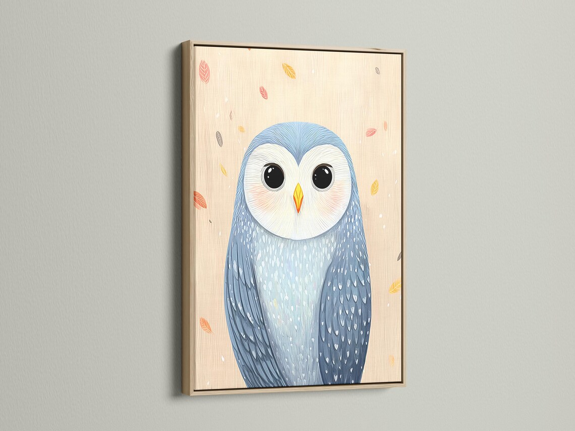 Illustrated owl portrait with big dark eyes, soft blue feathers and scattered pastel leaves on cream background detail view