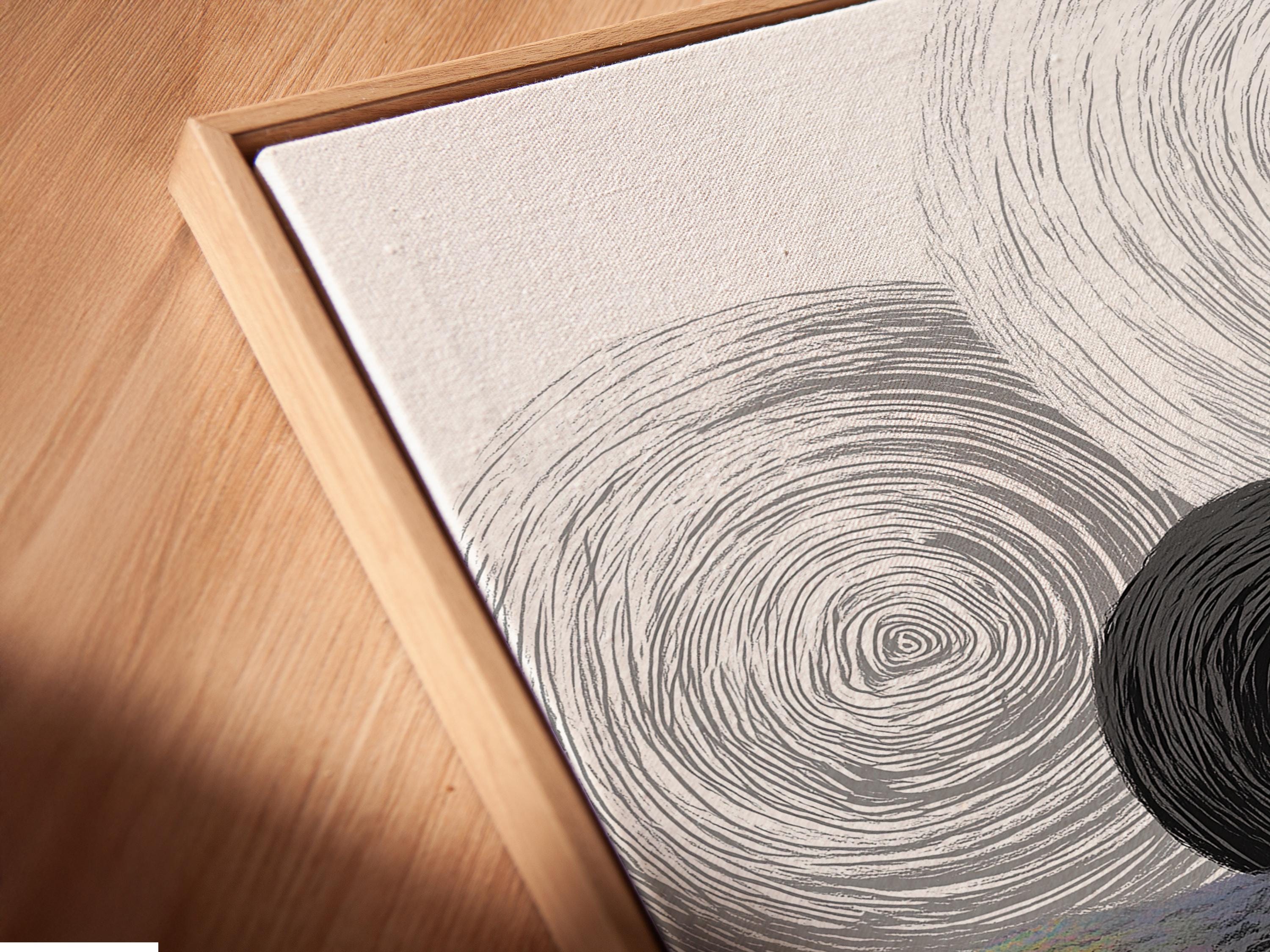 Monochrome abstract artwork with overlapping swirling rings in black, white and grey detail view