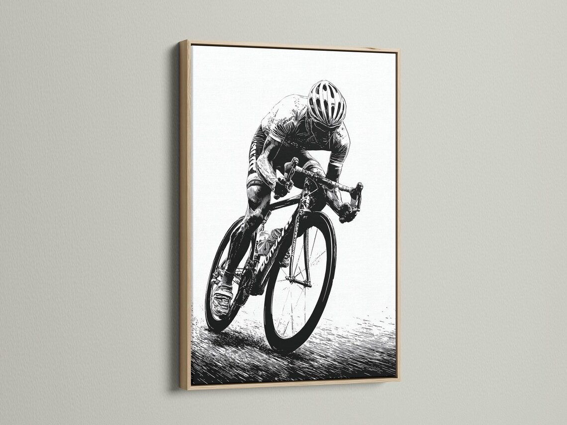 Room mockup showing a framed black and white cyclist illustration on a wall