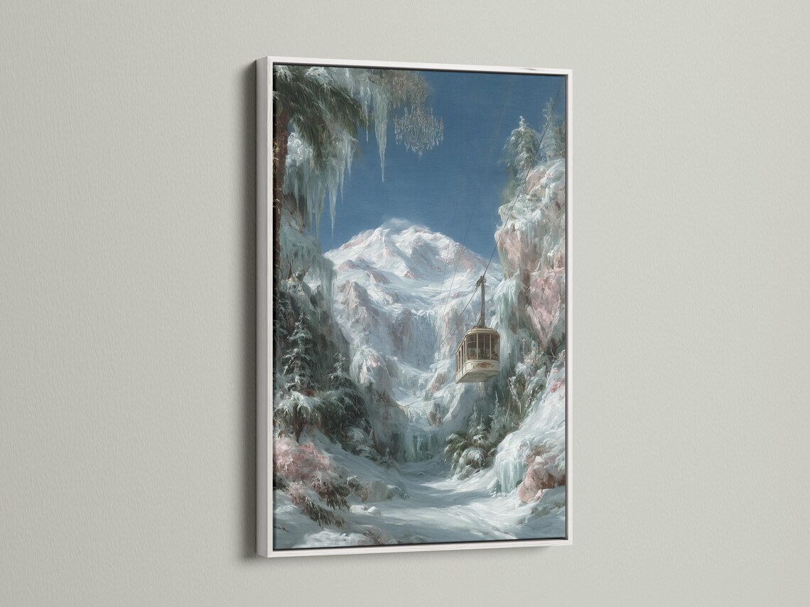 Wall mockup showing a framed snowy mountain cable car artwork on a light background