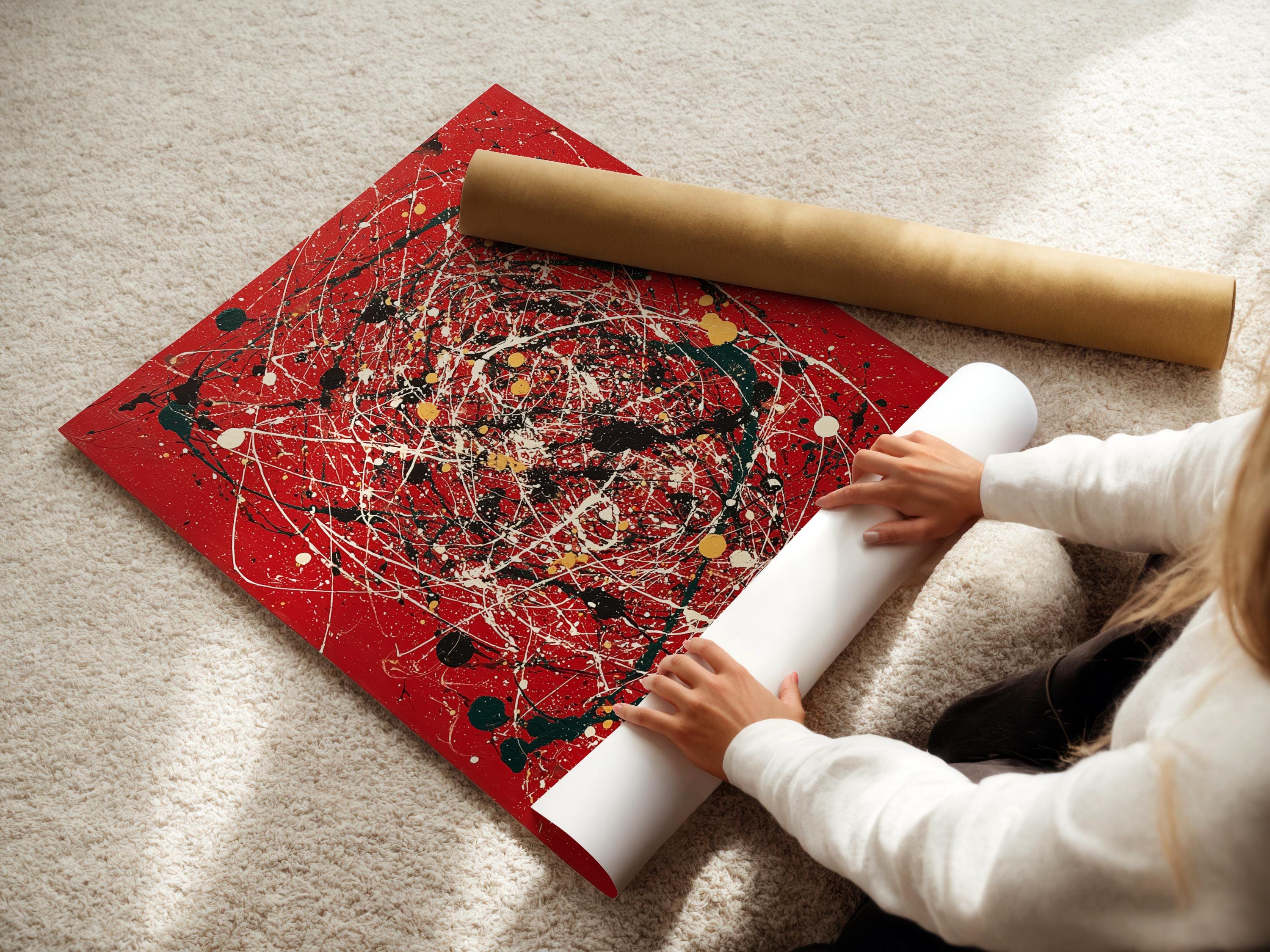 Red abstract artwork with white splatter lines, black and green shapes, and gold dots detail view