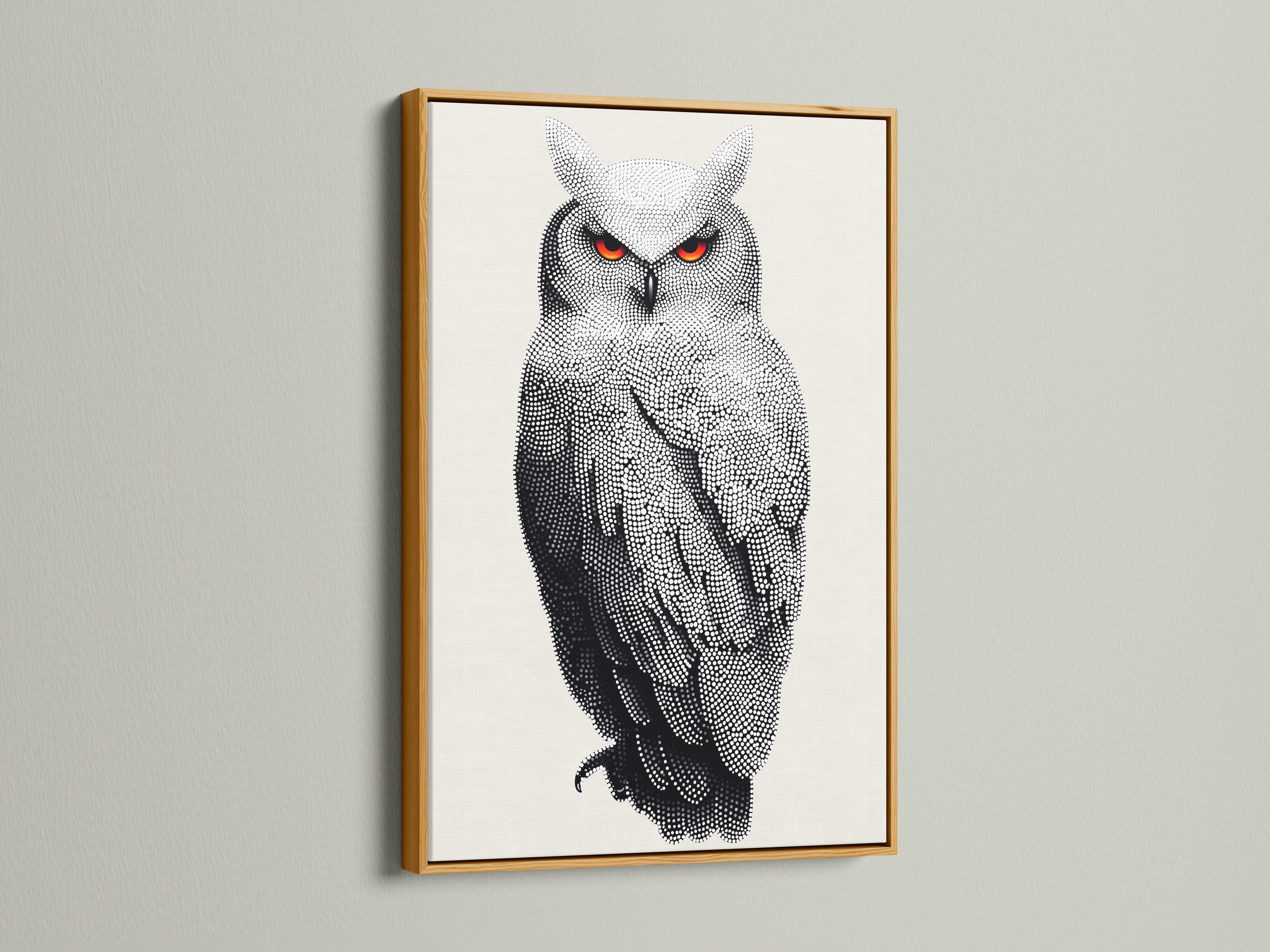 Dotted owl artwork in black and white with bright red-orange eyes detail view