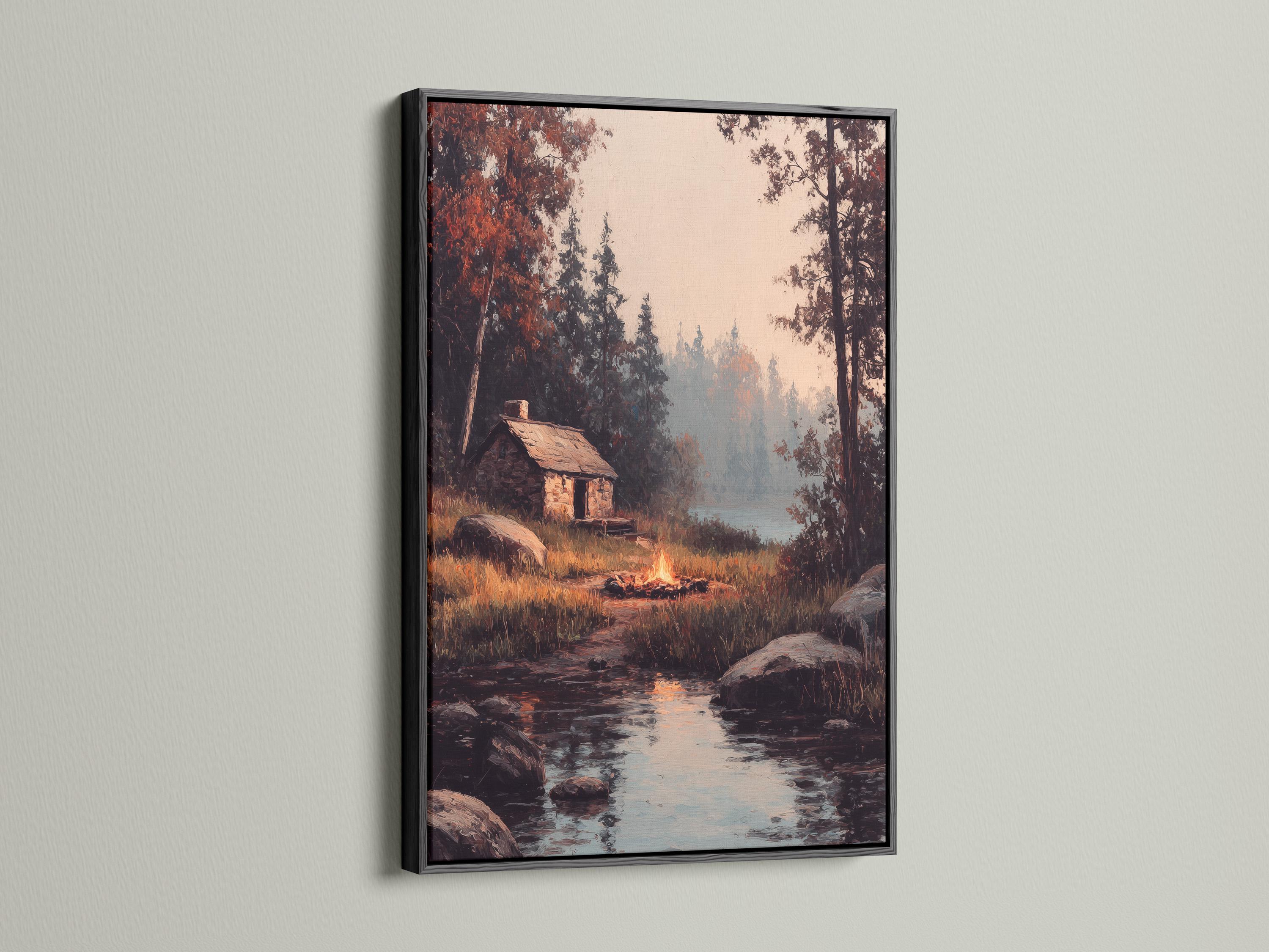 Wood-framed artwork of a rustic cabin scene in a product mockup view