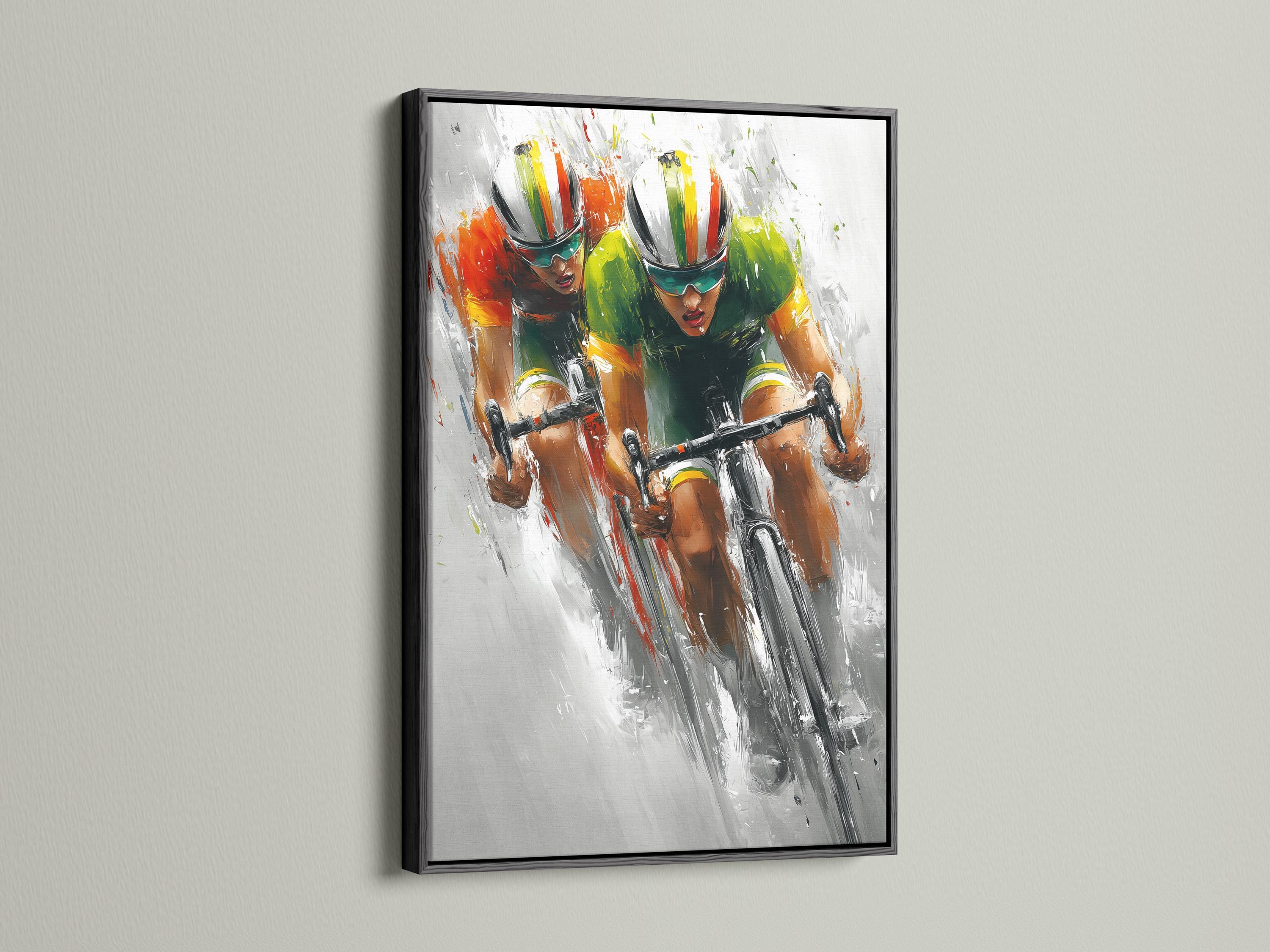 Cycling artwork mockup showing a framed print with two cyclists racing diagonally