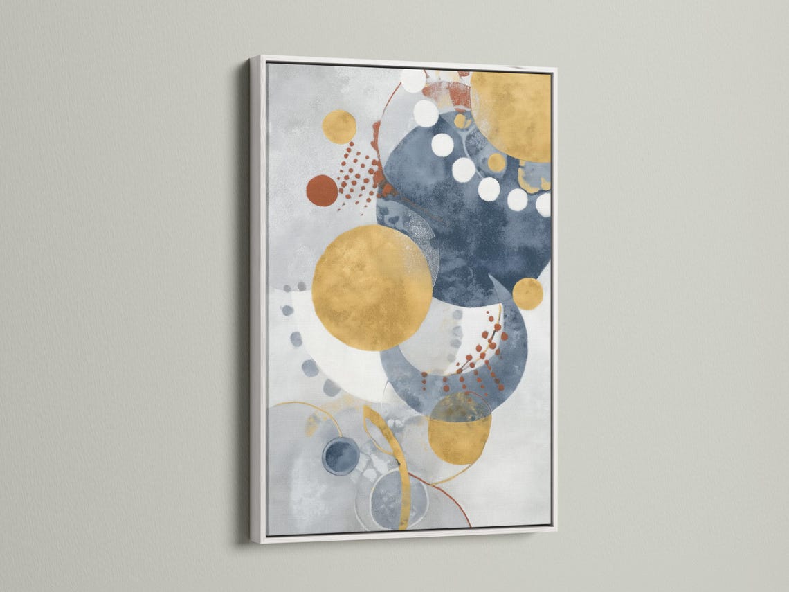 Abstract navy blue and mustard gold circle artwork shown in a framed mockup on a light background