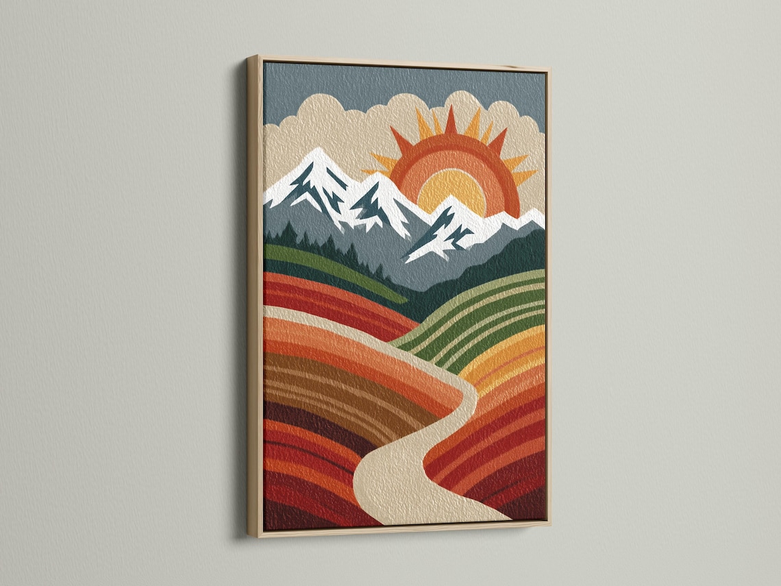 A stylised mountain landscape sits beneath a large retro sun, with layered fields of striped colour and jagged ridge lines detail view