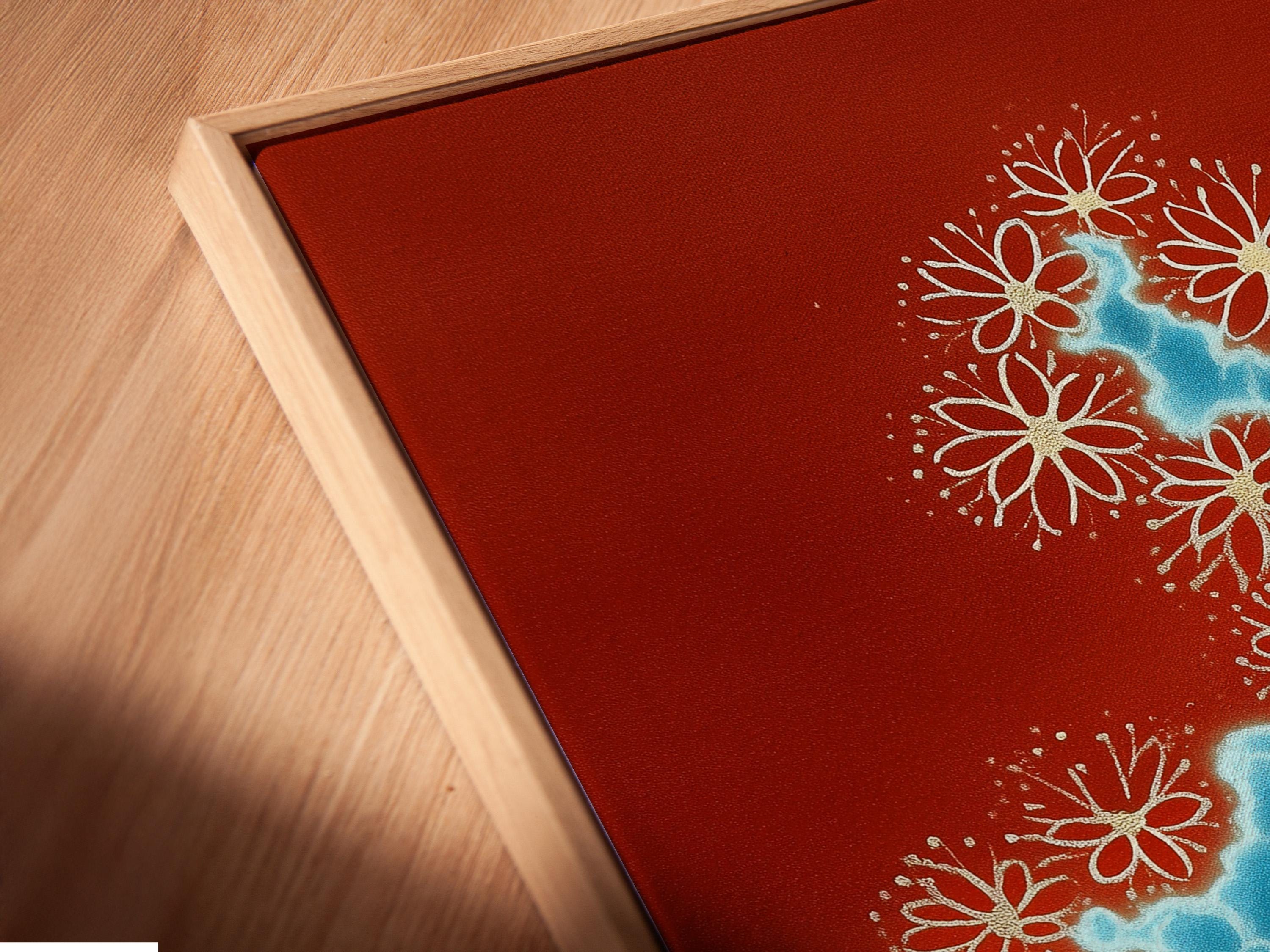 Wall mockup showing framed red abstract river artwork with blue water shape and white flowers