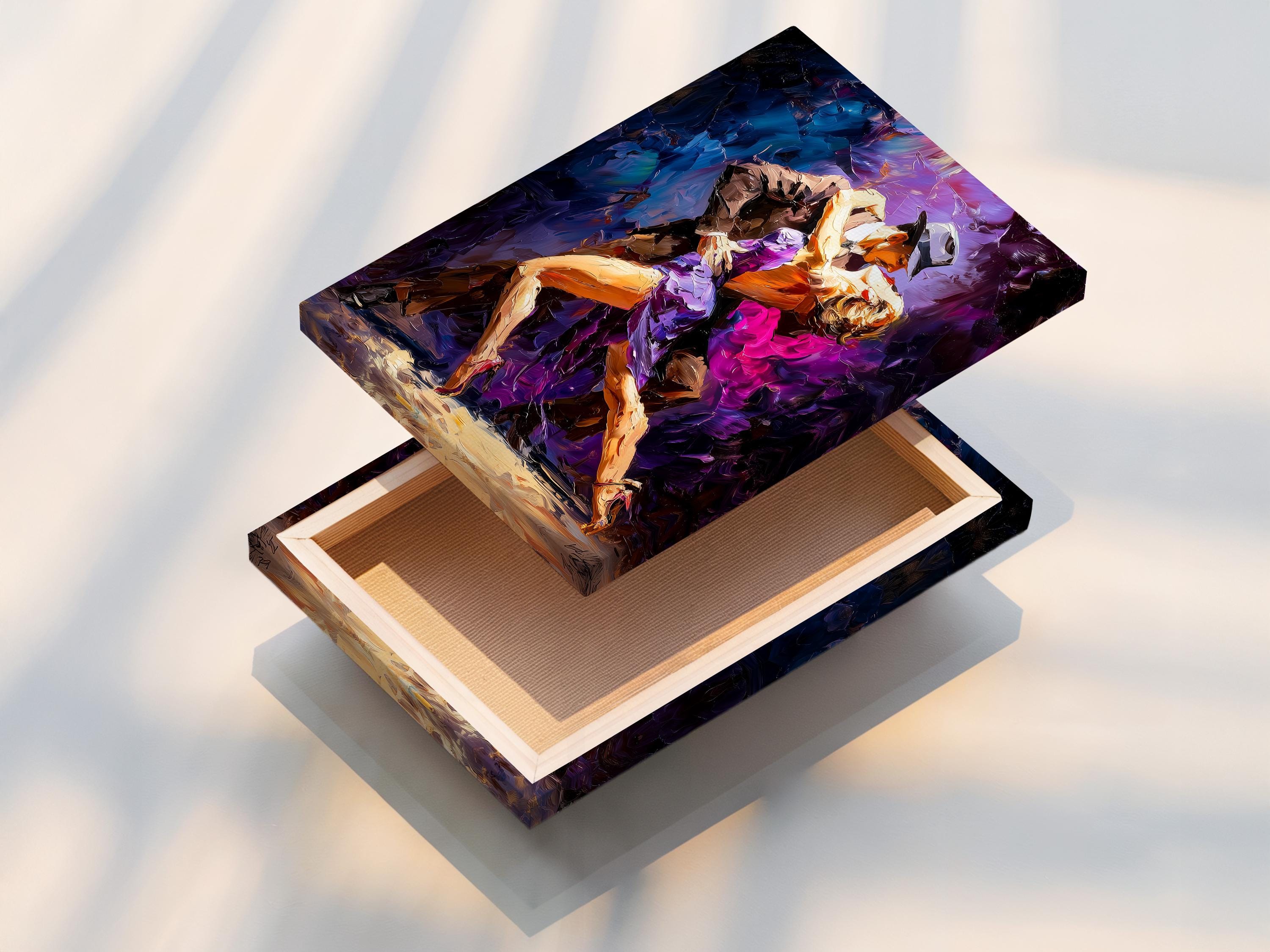 Framed tango dance artwork showing two dancing figures in purple, blue and gold tones detail view
