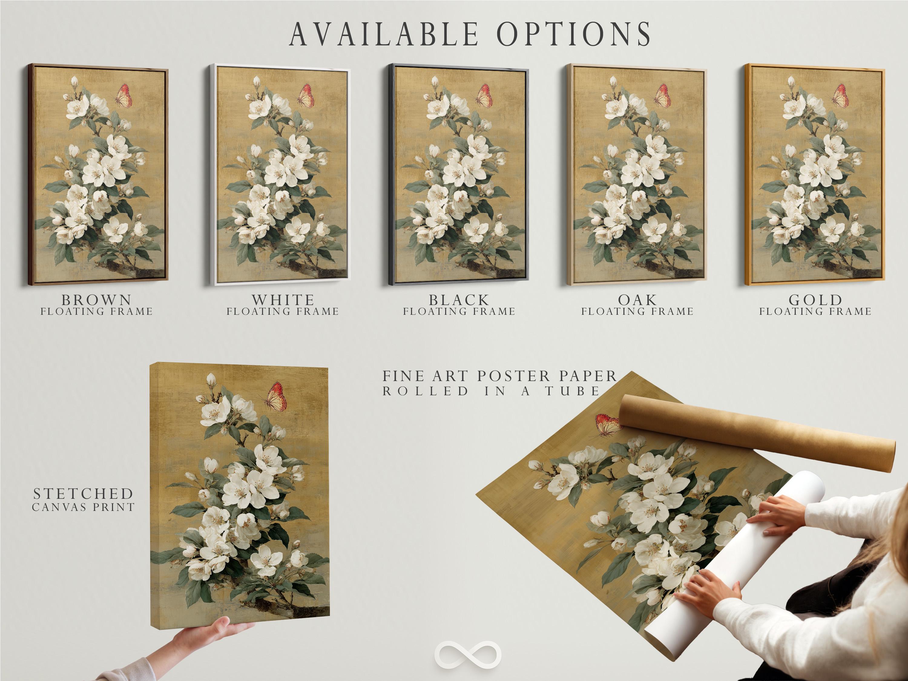 Vertical framed artwork mockup on a light wall with a bouquet of white blossoms and a butterfly