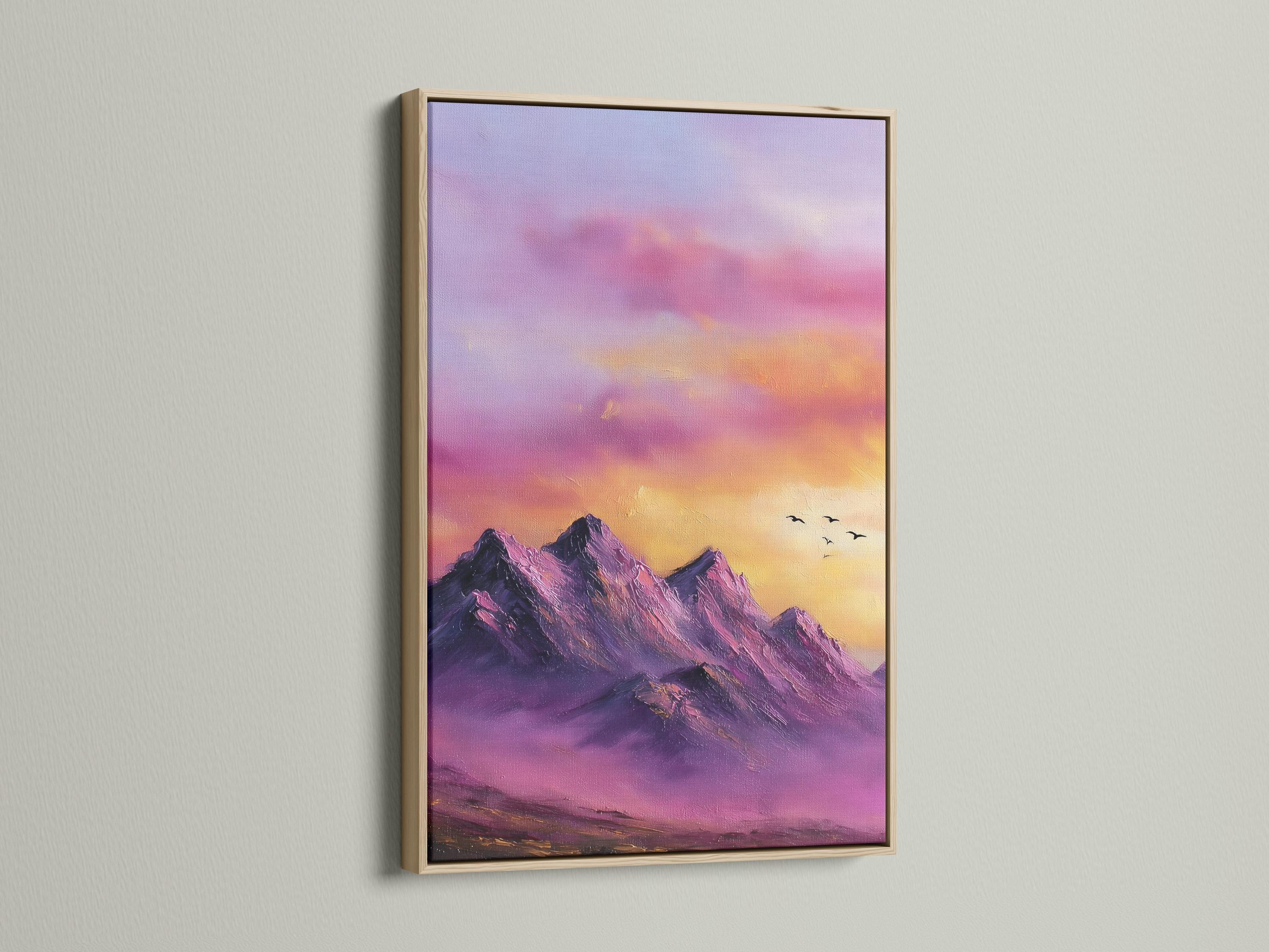 Purple and pink mountain sunset landscape with small birds in flight detail view