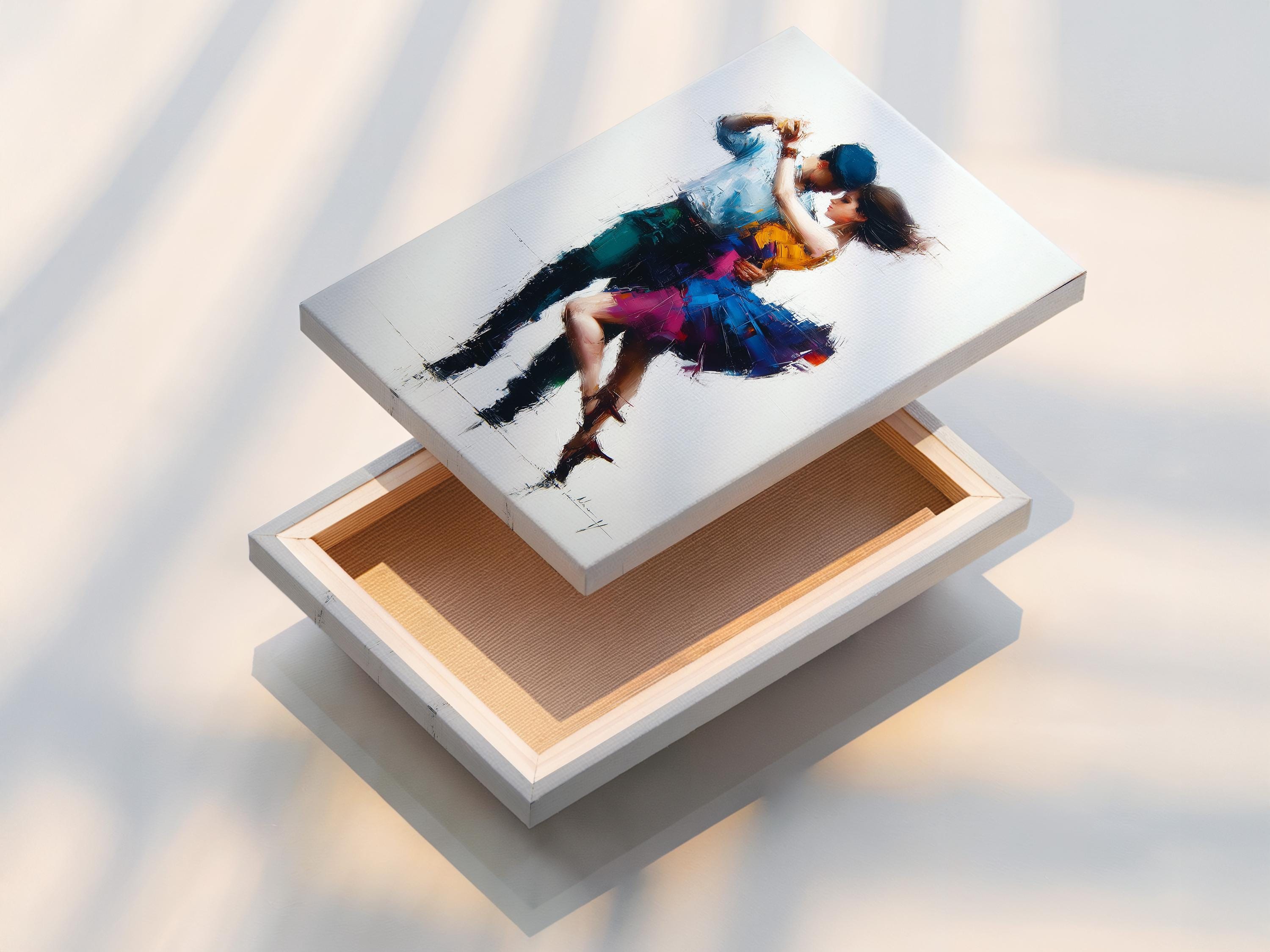 Framed wall artwork featuring a painterly tango couple in blue and gold
