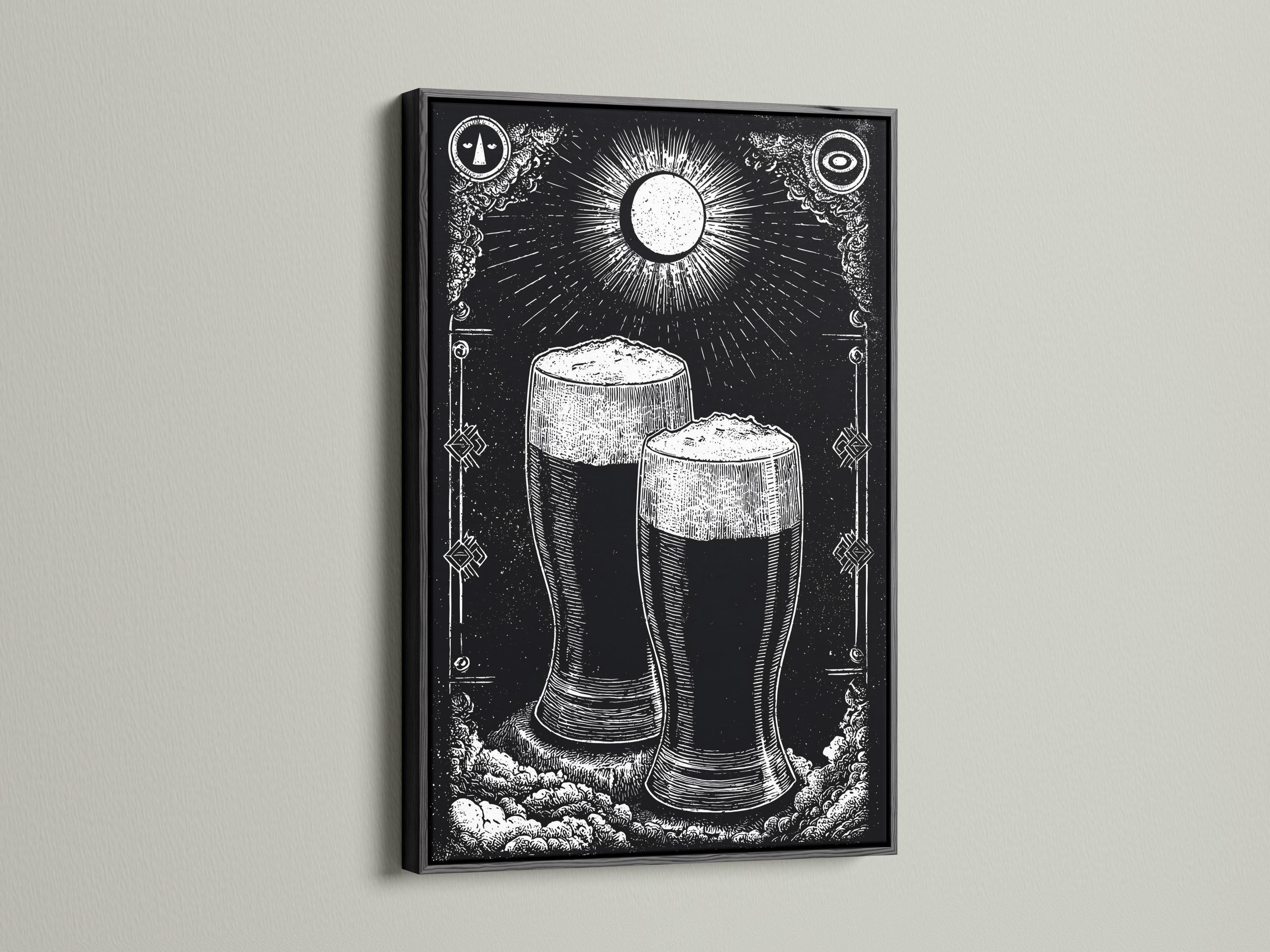Person holding a framed black-and-white beer mug illustration in a workshop-style bar setting