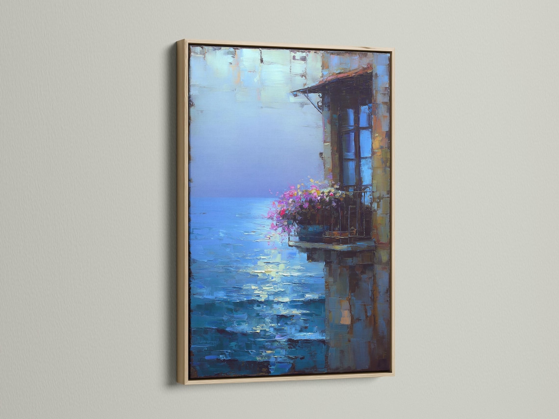 Room mockup showing a framed blue seascape artwork with pink flowers