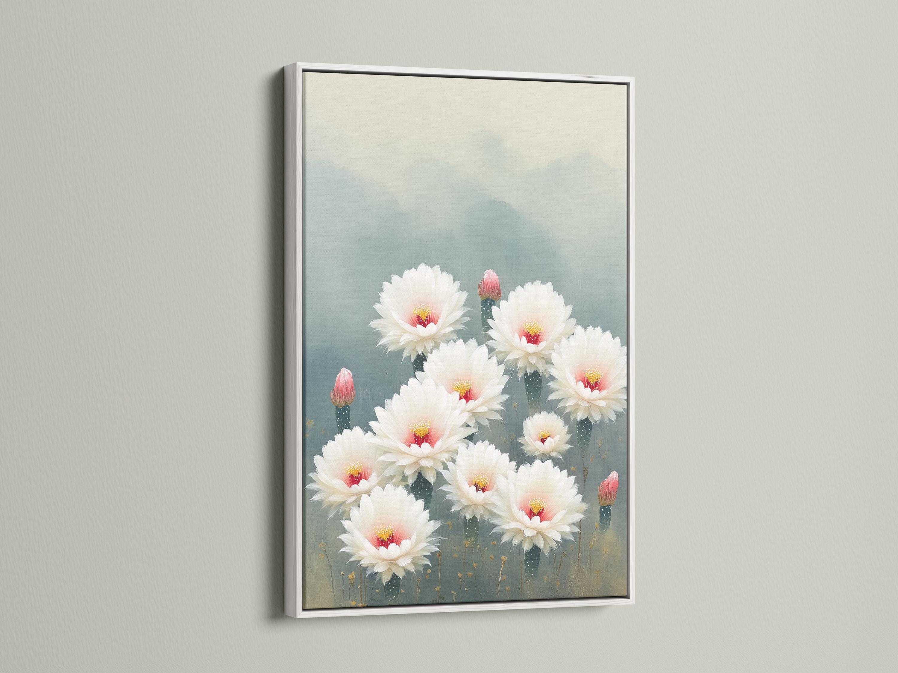 White cactus flowers with pink-red centres and gold specks on a blue-grey background detail view