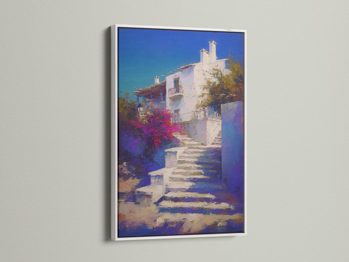 Painterly blue sky coastal buildings with whitewashed walls and vivid magenta vegetation detail view
