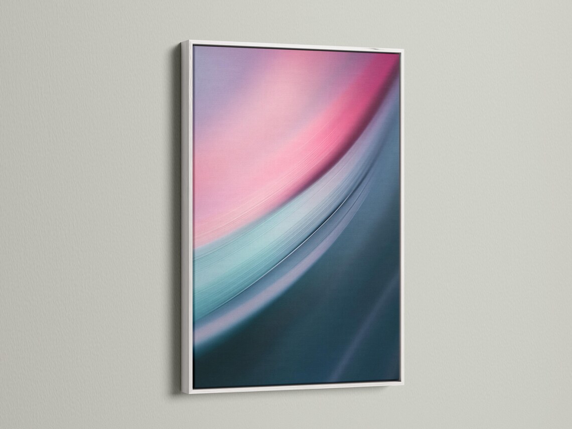 Abstract artwork with sweeping pink and teal curved gradients detail view