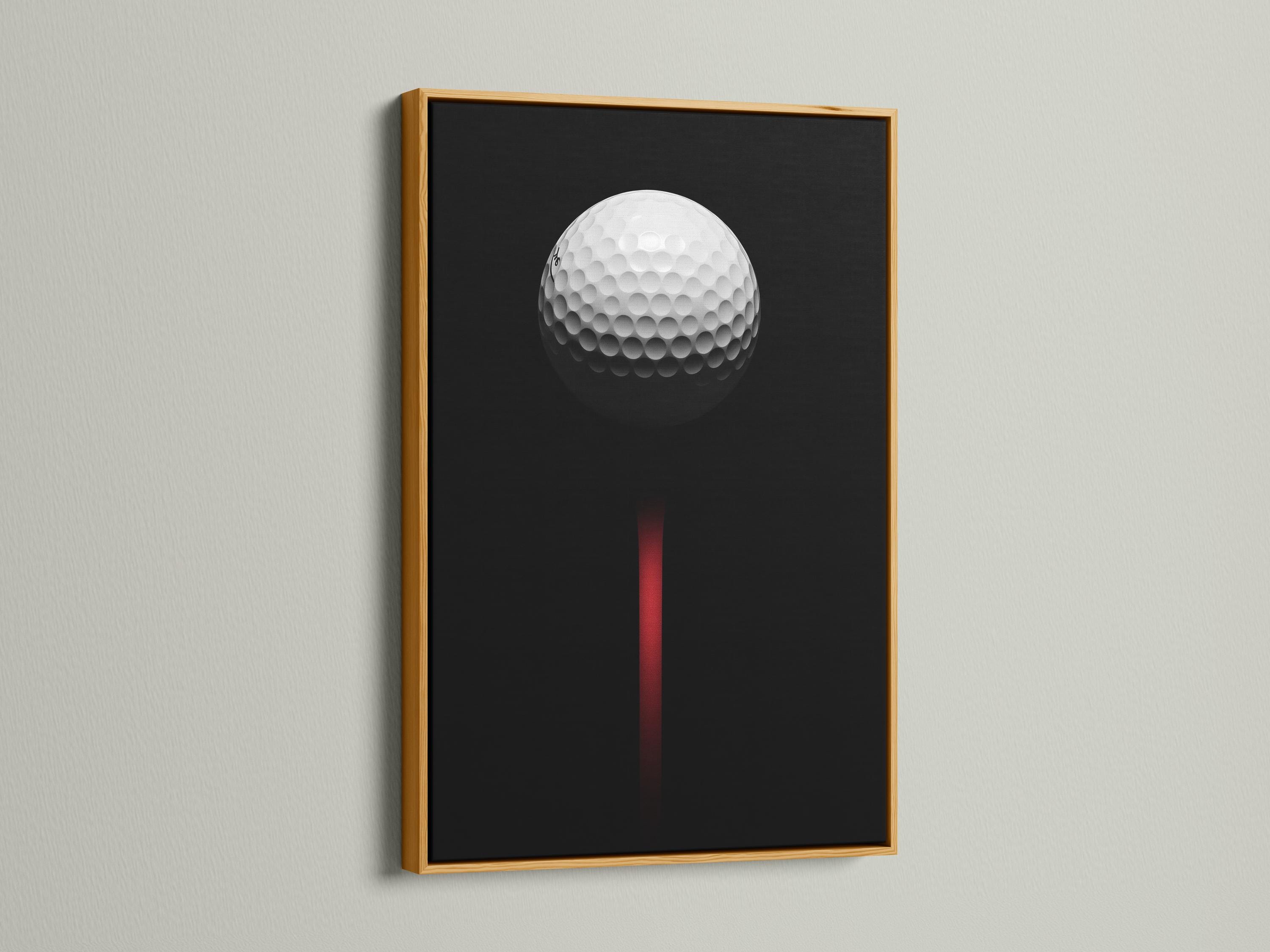 Minimalist golf ball design on a black background with a vivid red vertical accent detail view
