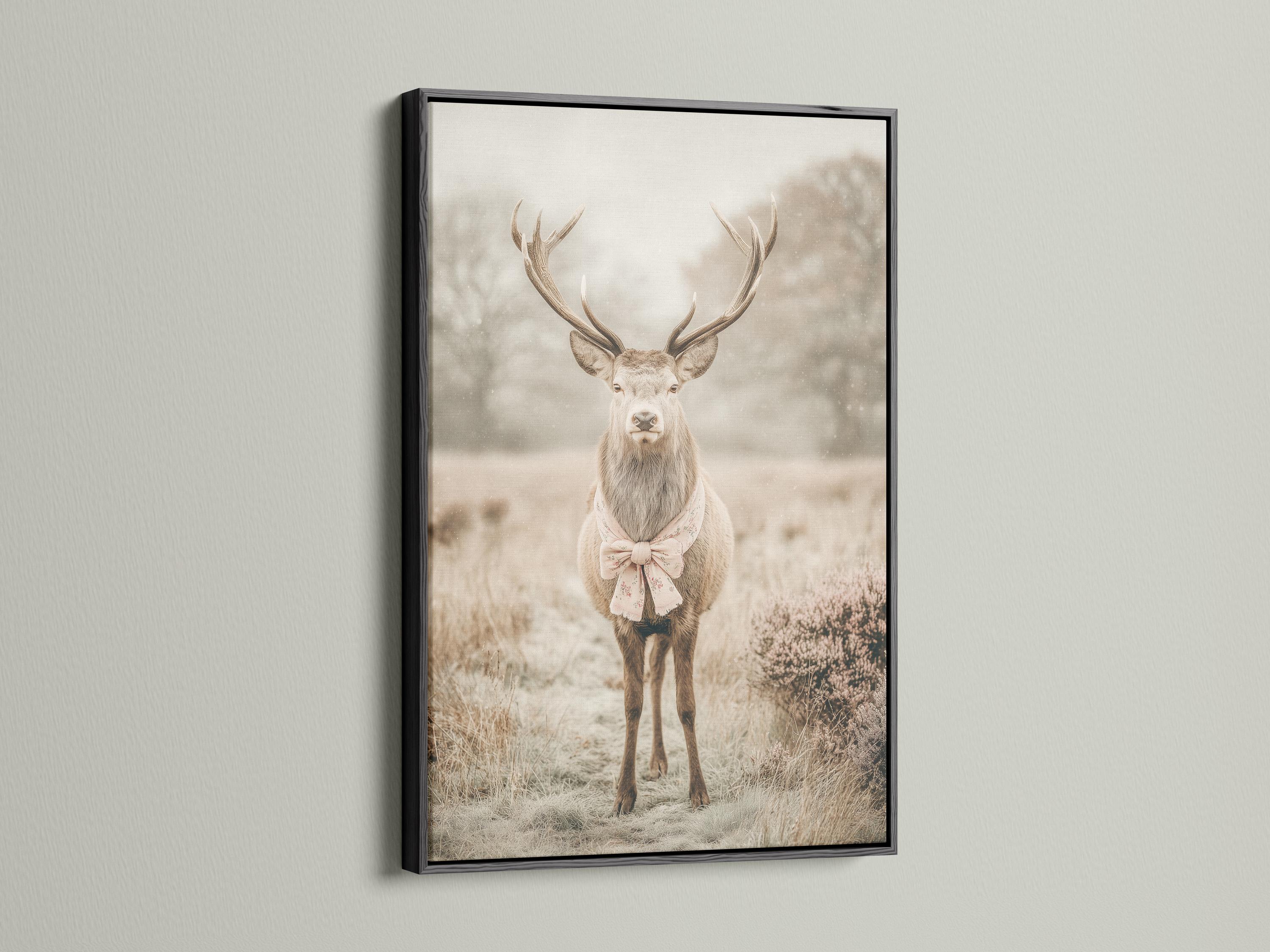 Deer portrait with raised antlers in a misty field, wearing a pale pink bow detail view