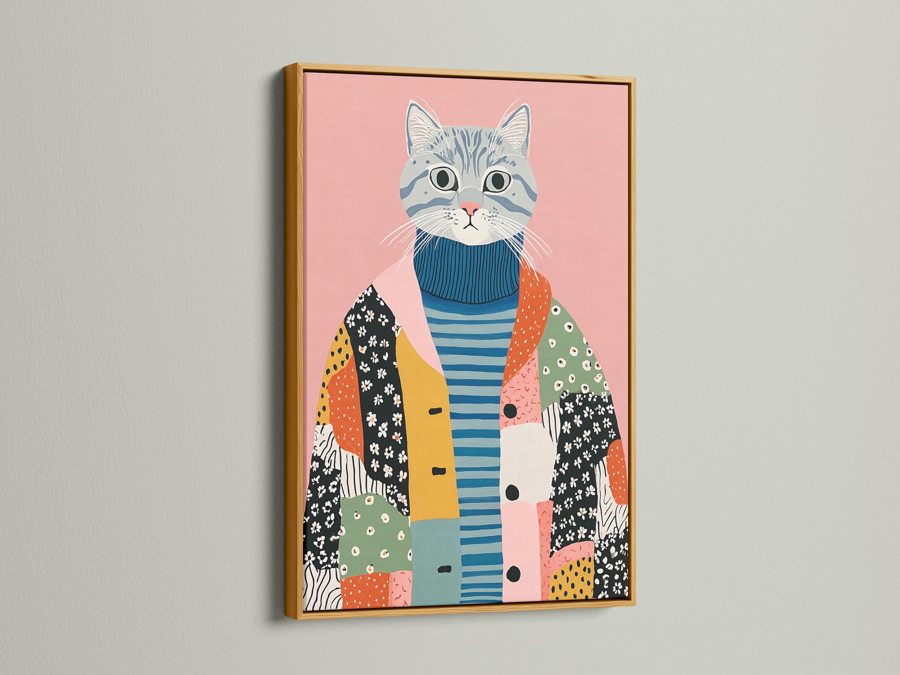 A pink background cat portrait wearing a blue striped sweater with patchwork shapes below detail view