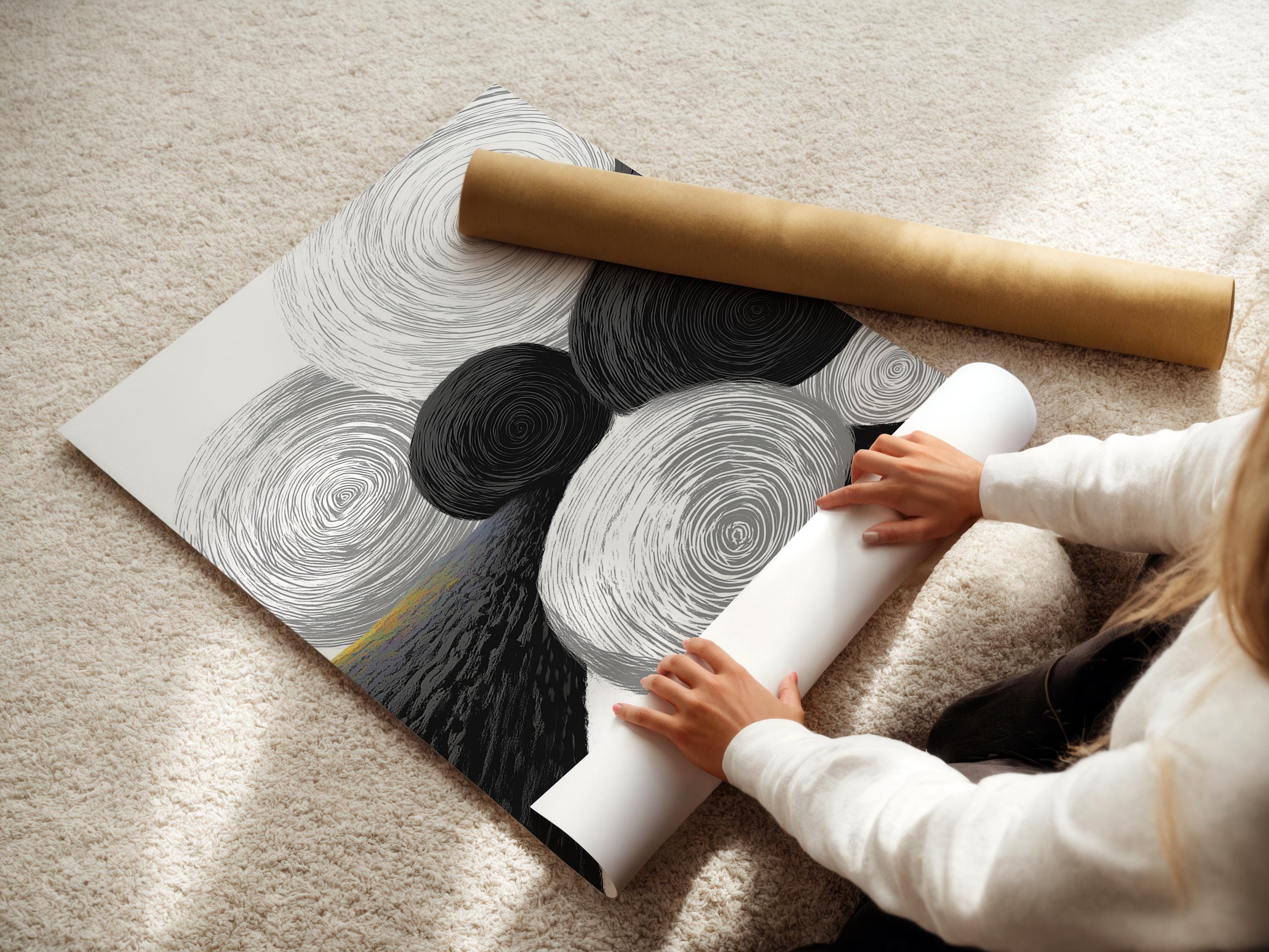 Monochrome abstract artwork with overlapping swirling rings in black, white and grey detail view