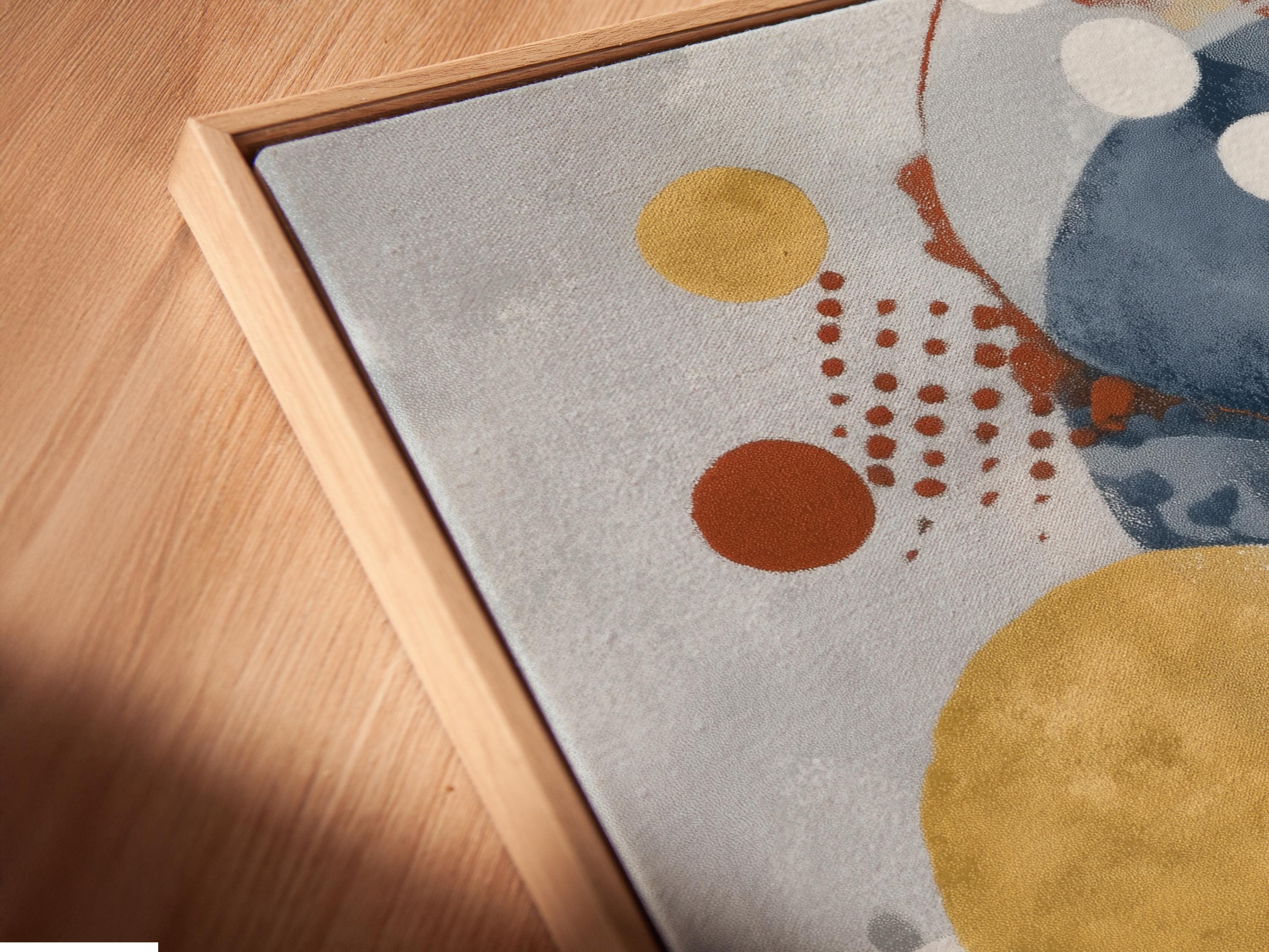 Abstract navy blue and mustard gold circle artwork shown in a framed mockup on a light background