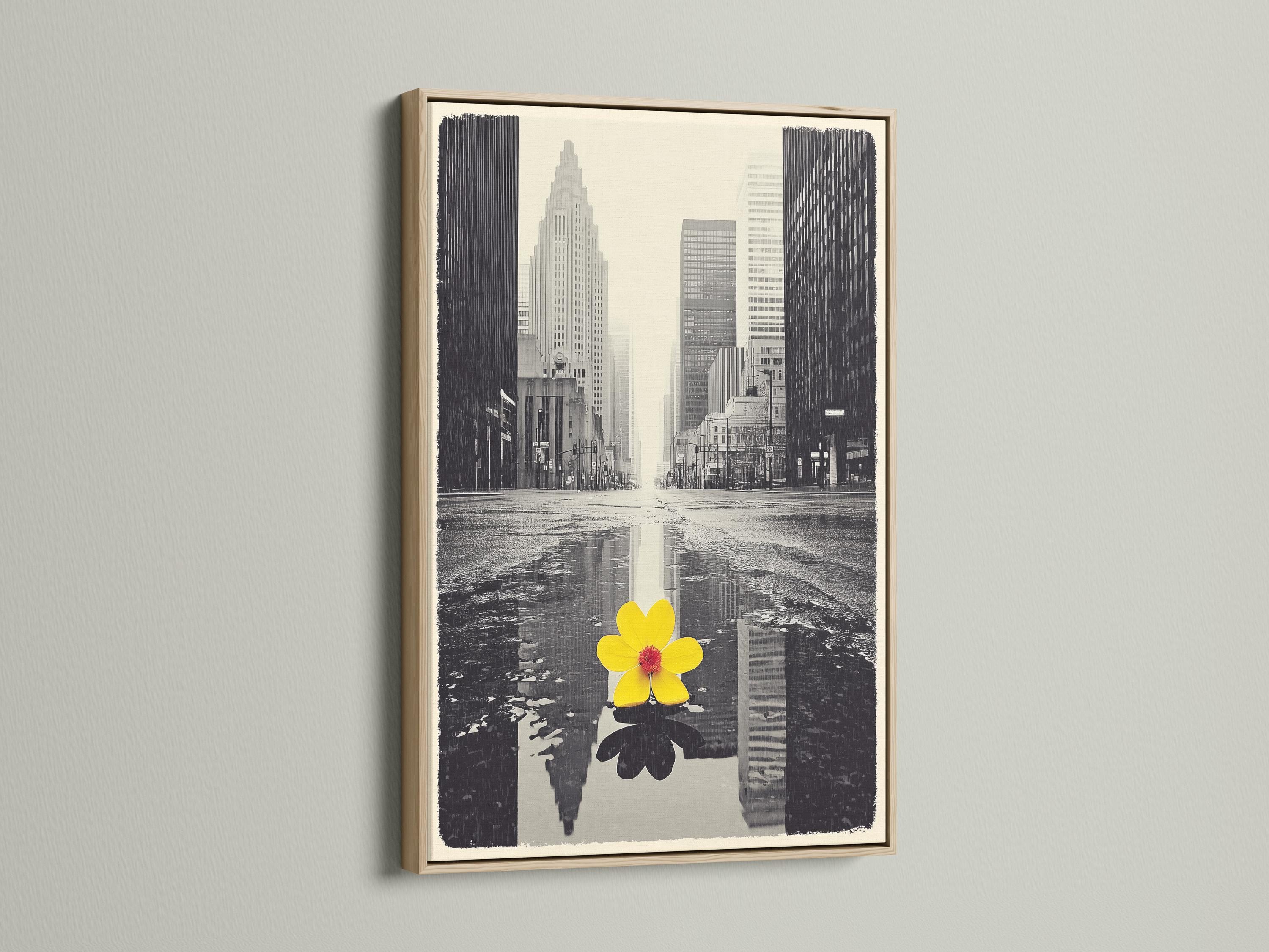 A monochrome city skyline is overlaid with a single bright yellow flower, reflected in water-like bands, creating a high-contrast urban accent detail